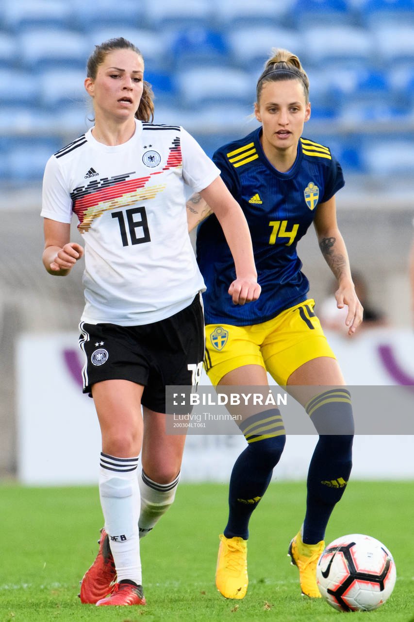 Melanie Leupolz of Germany and Nathalie Björn of Sweden