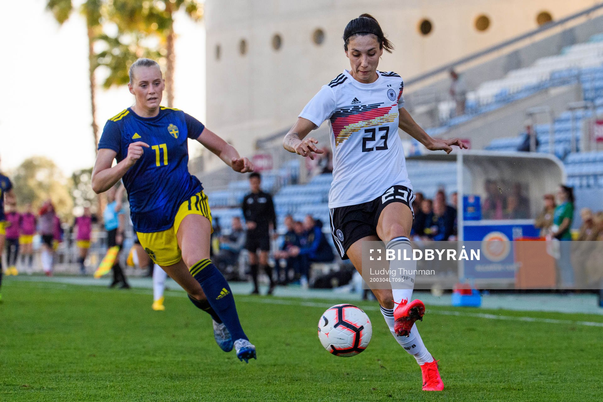 Stina Blackstenius of Sweden and Sara Doorsoun of Germany
