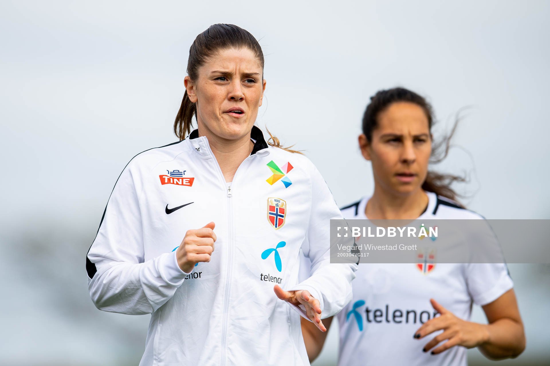 Maren Mjelde and Ingrid Moe Wold of Norway warm up