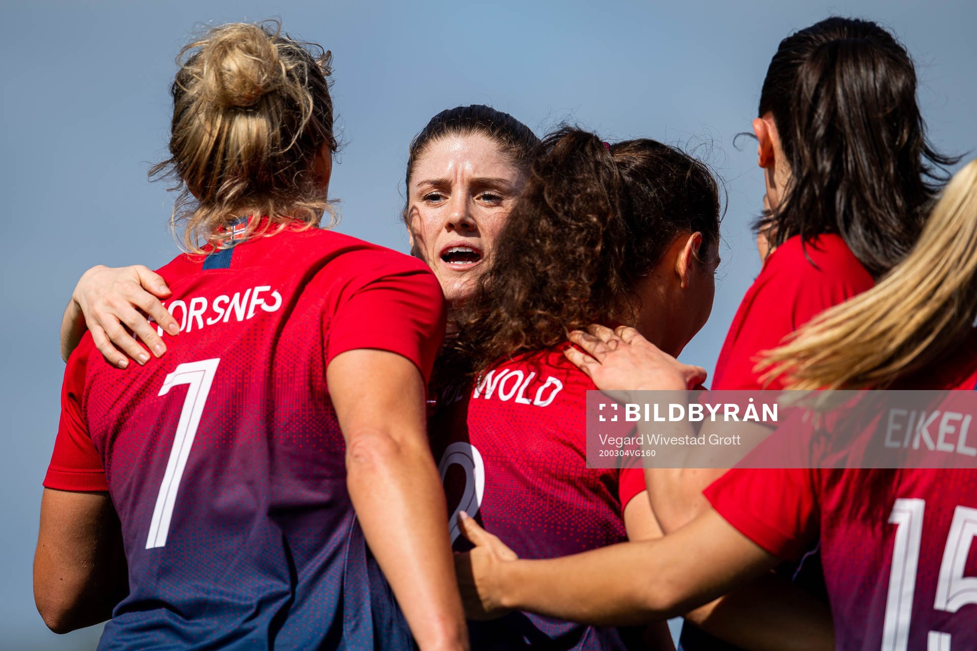 Elise Thorsnes of Norway celebrates with Maren Mjelde and