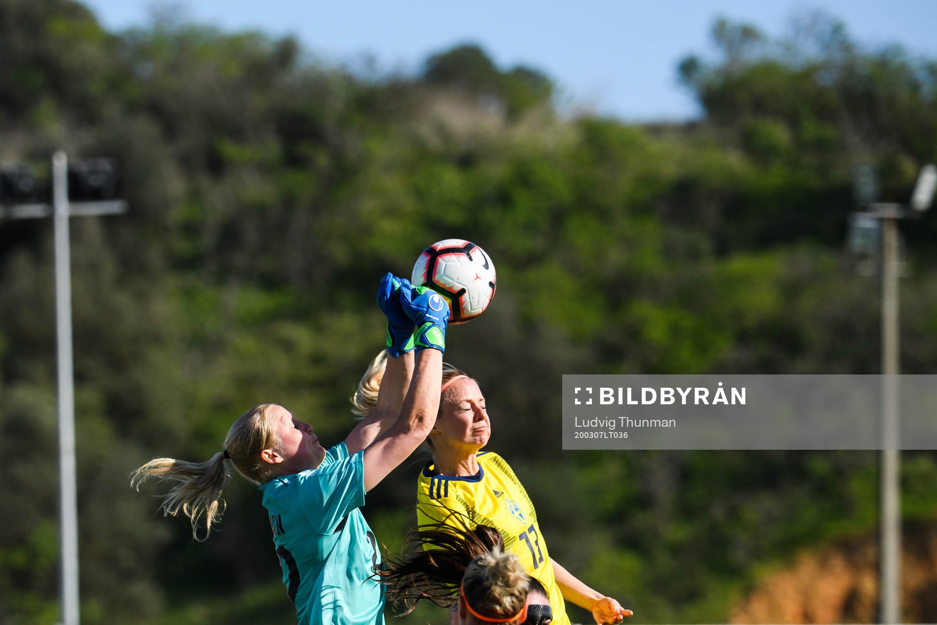 Goalkeeper Kathrine Larsen of Denmark and Amanda Ilestedt