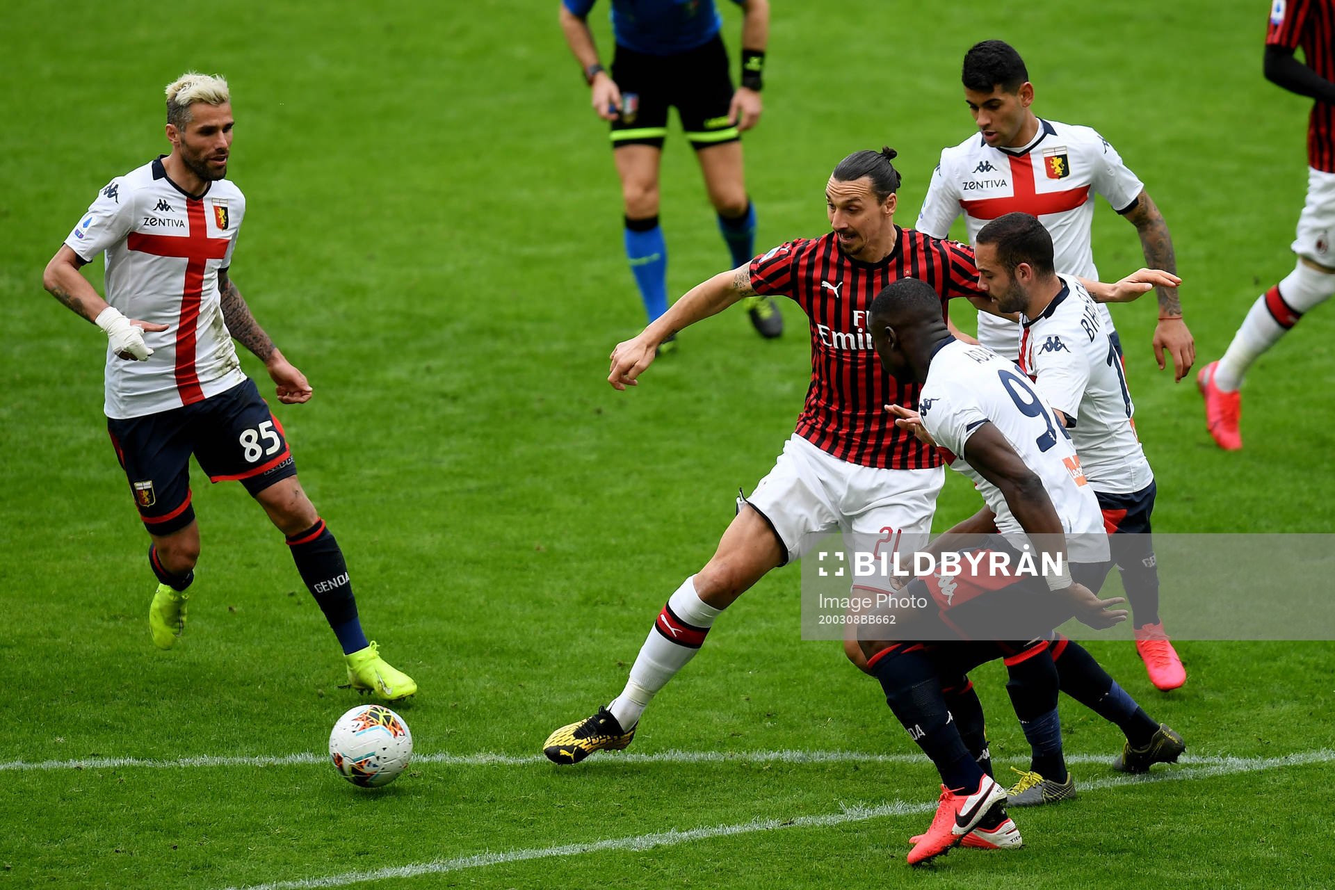 Zlatan Ibrahimovic of Milan and Antonio Biraschi of Genoa
