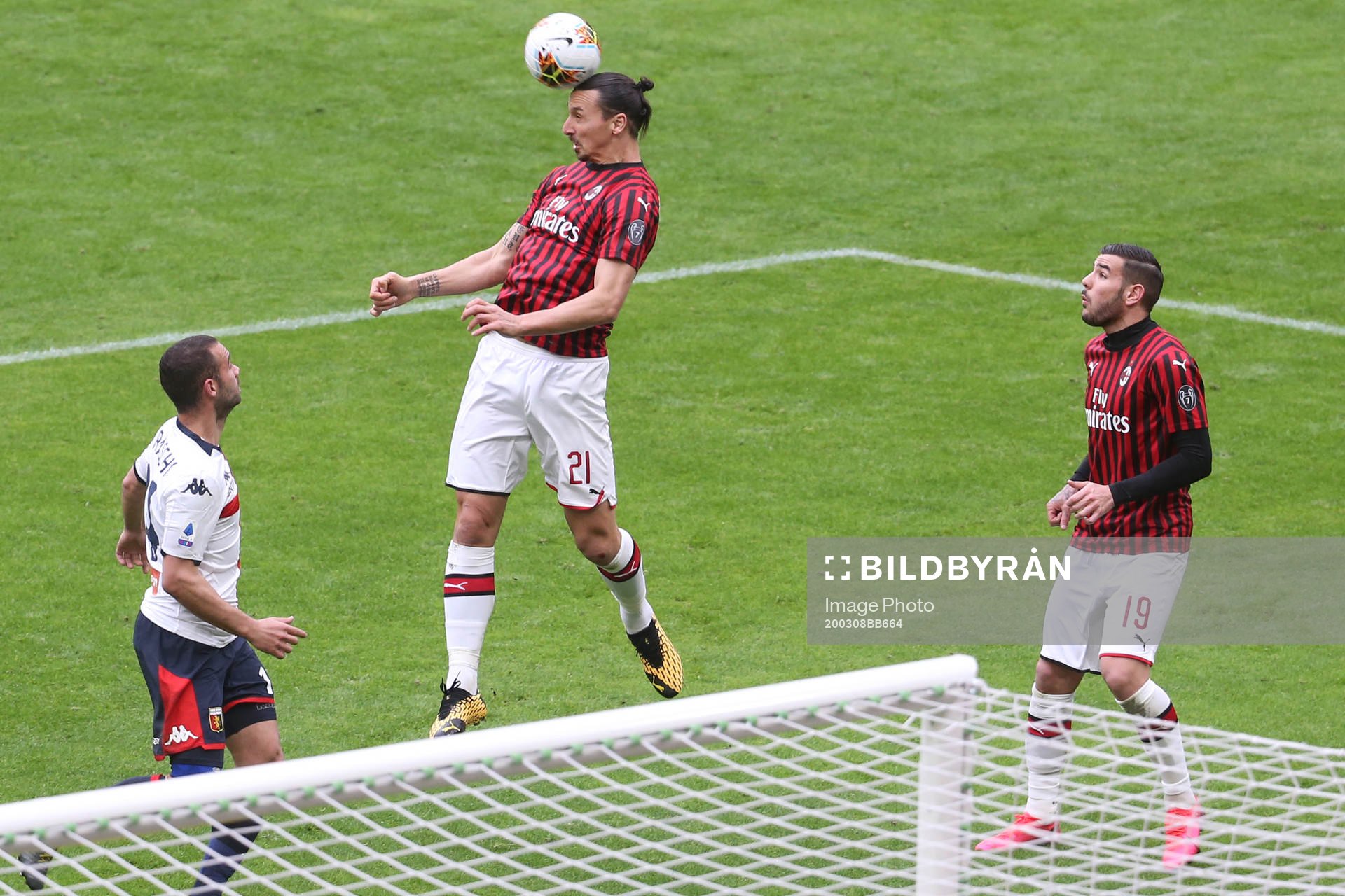 Zlatan Ibrahimovic of Milan and Antonio Biraschi of Genoa