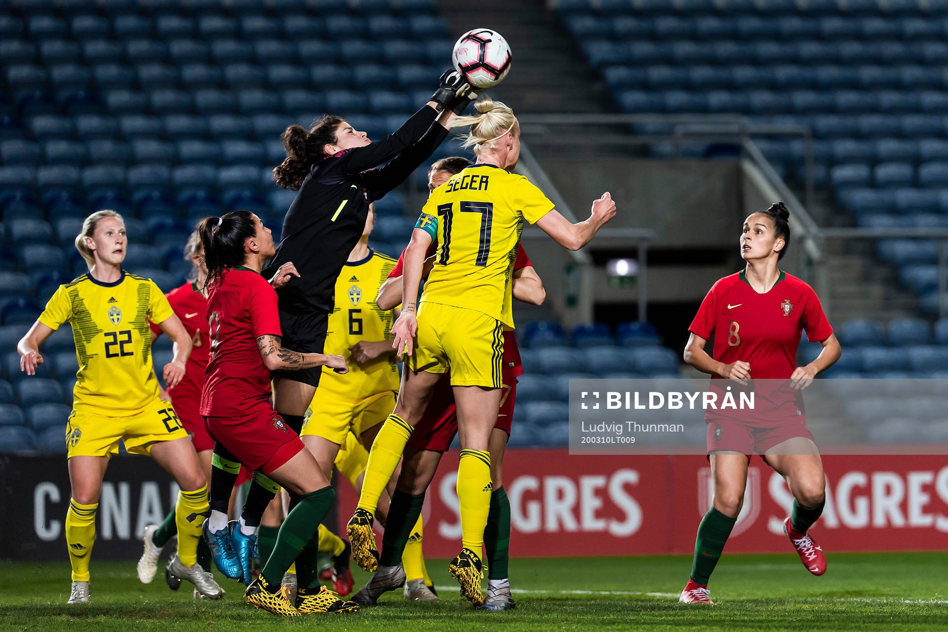 goalkeer Ines Pereira of Portugal against Caroline Seger of