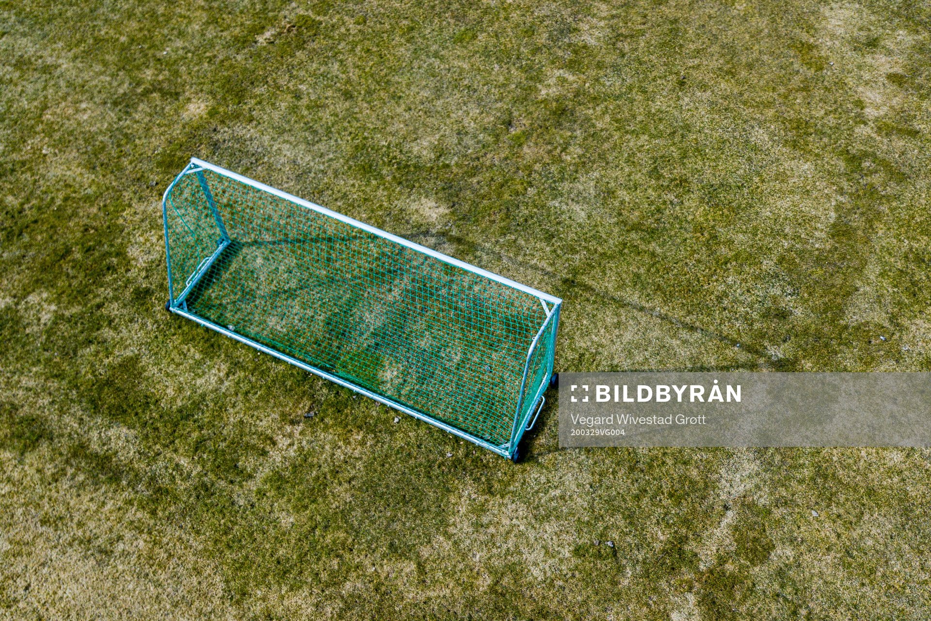 General view of an empty football pitch as the Coronavirus,