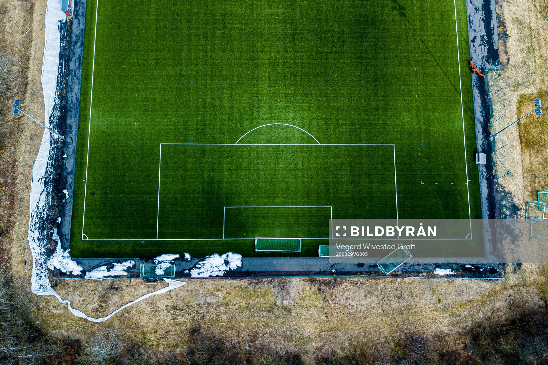 General view of an empty football pitch as the Coronavirus,