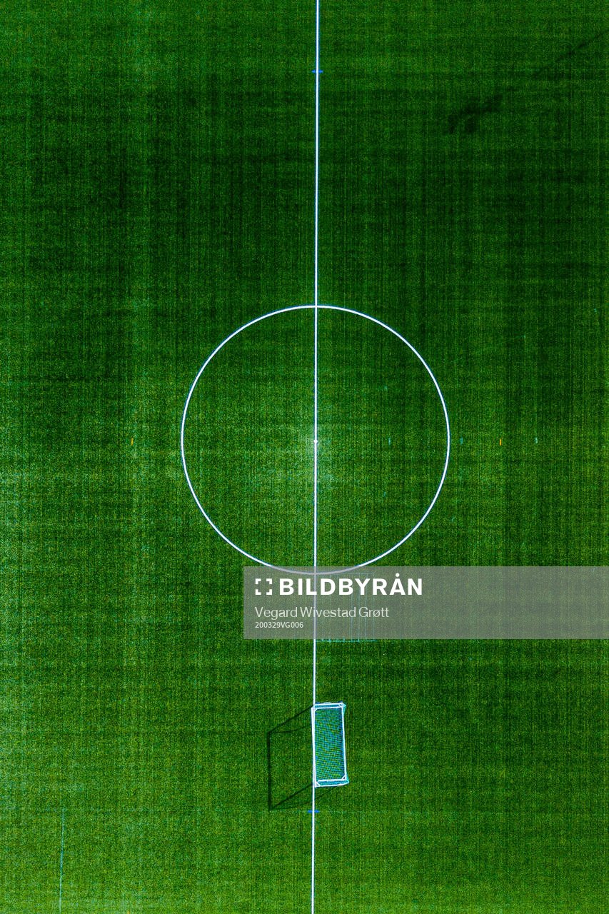 General view of an empty football pitch as the Coronavirus,