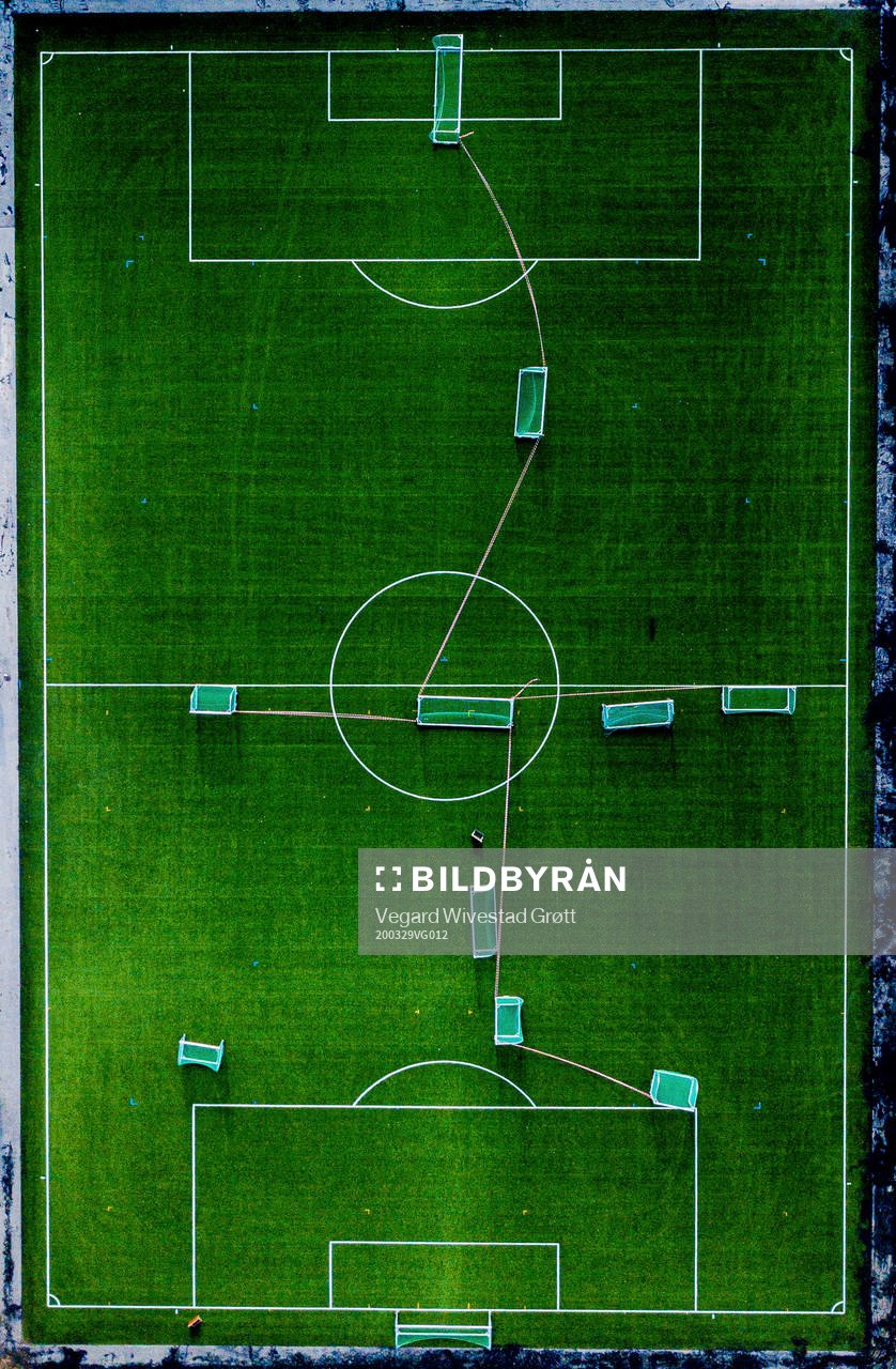 General view of an empty football pitch as the Coronavirus,