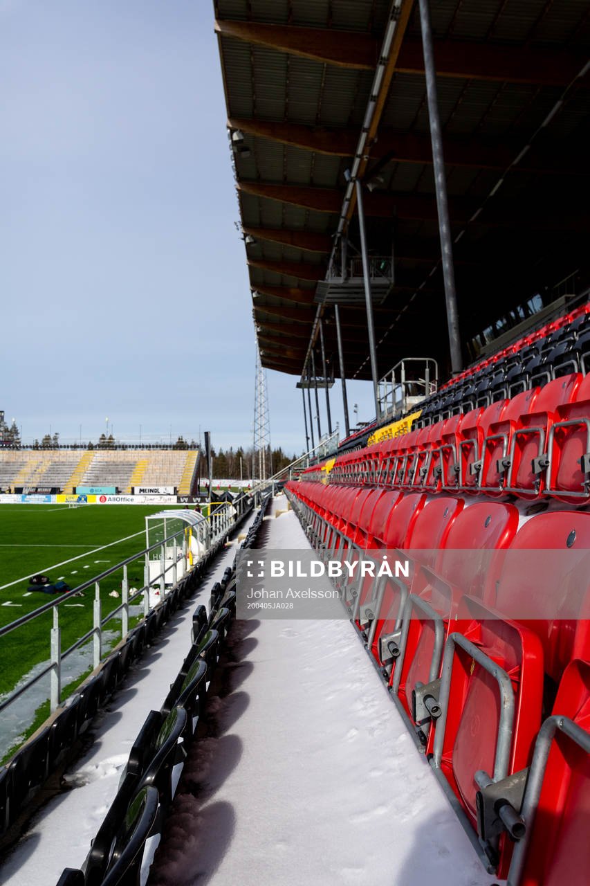 Spectator seats in snow at Jämtkraft Arena as the