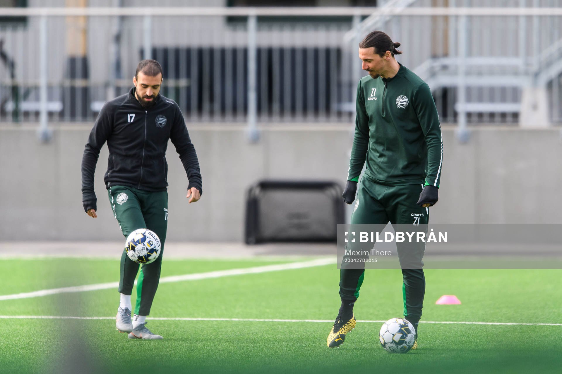 Abdul Khalili and Zlatan Ibrahimovic participate in a