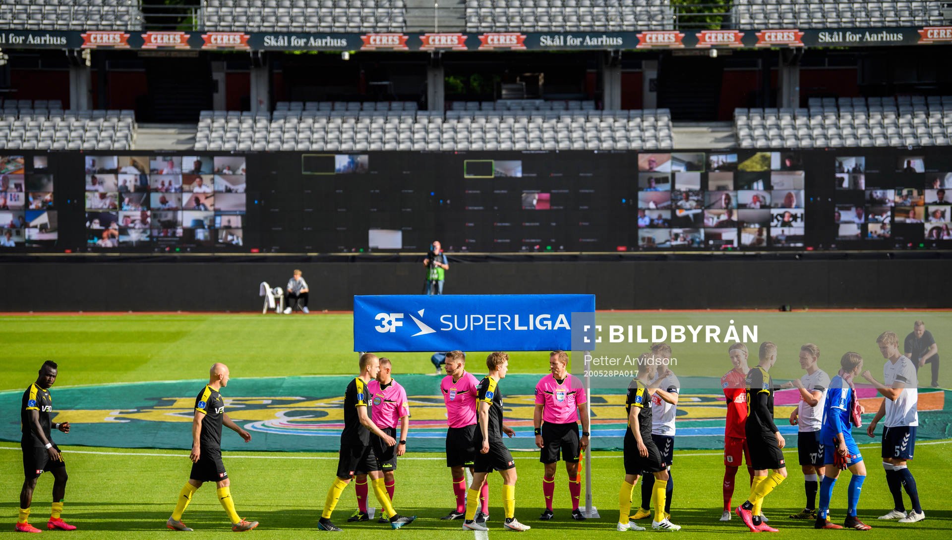 Line up infront of a virtual grandstand with supporters