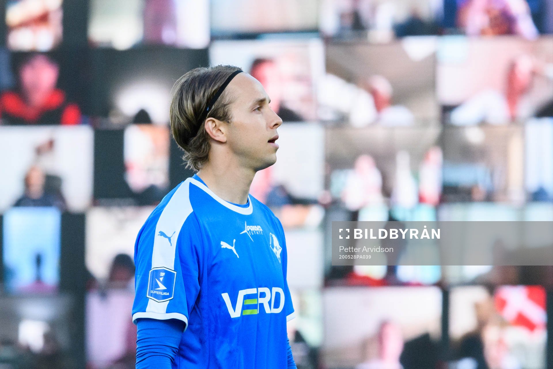 Goalkeeper Patrik Carlgren of Randers infront of a virtual grandstand with supporters during the Danish Superliga match between AGF Aarhus and Randers FC which are played without spectators due to the coronavirus covid-19, on May 28, 2020 in Aarhus.