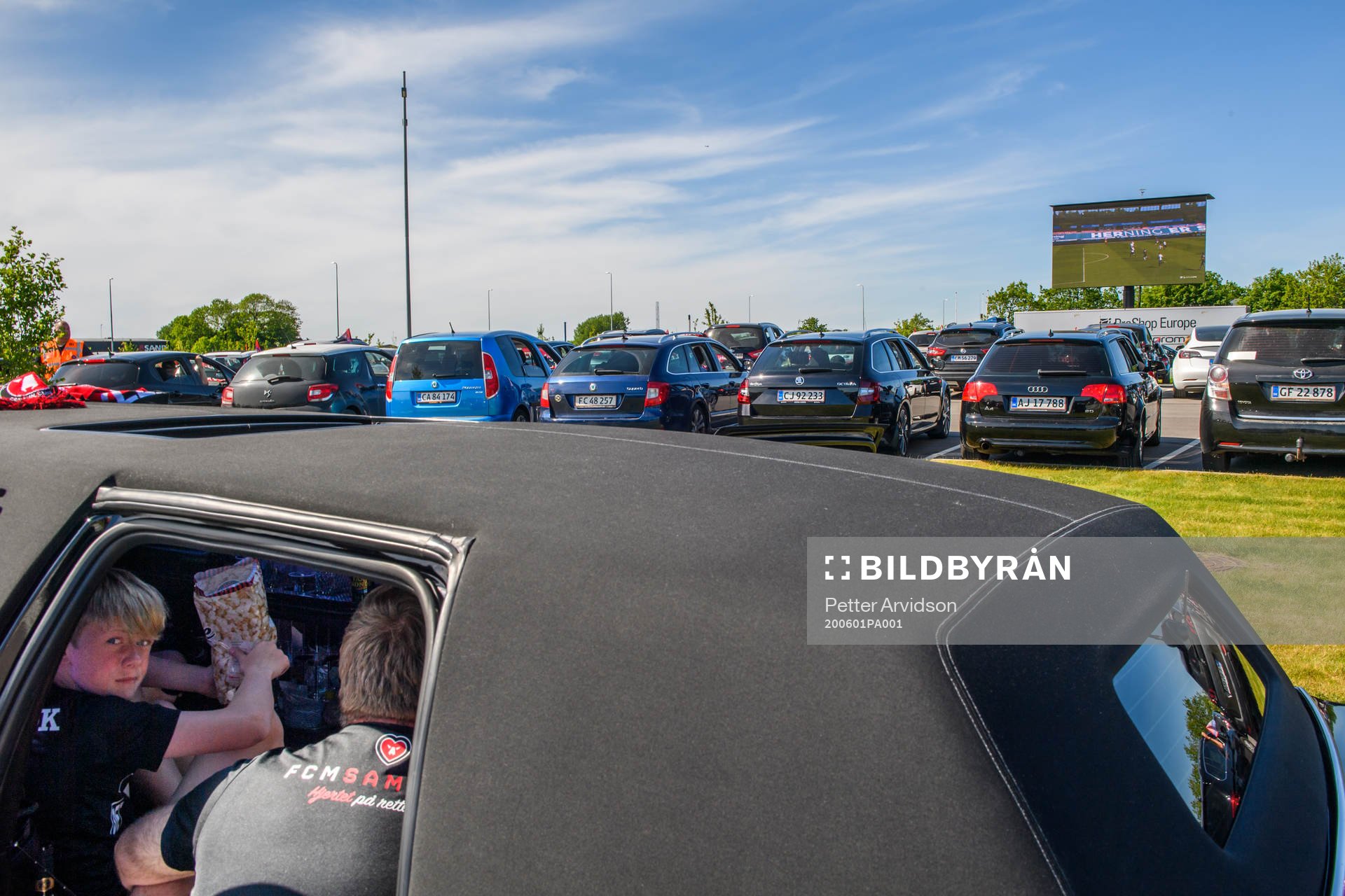 Fans watch the Danish Superliga match between FC