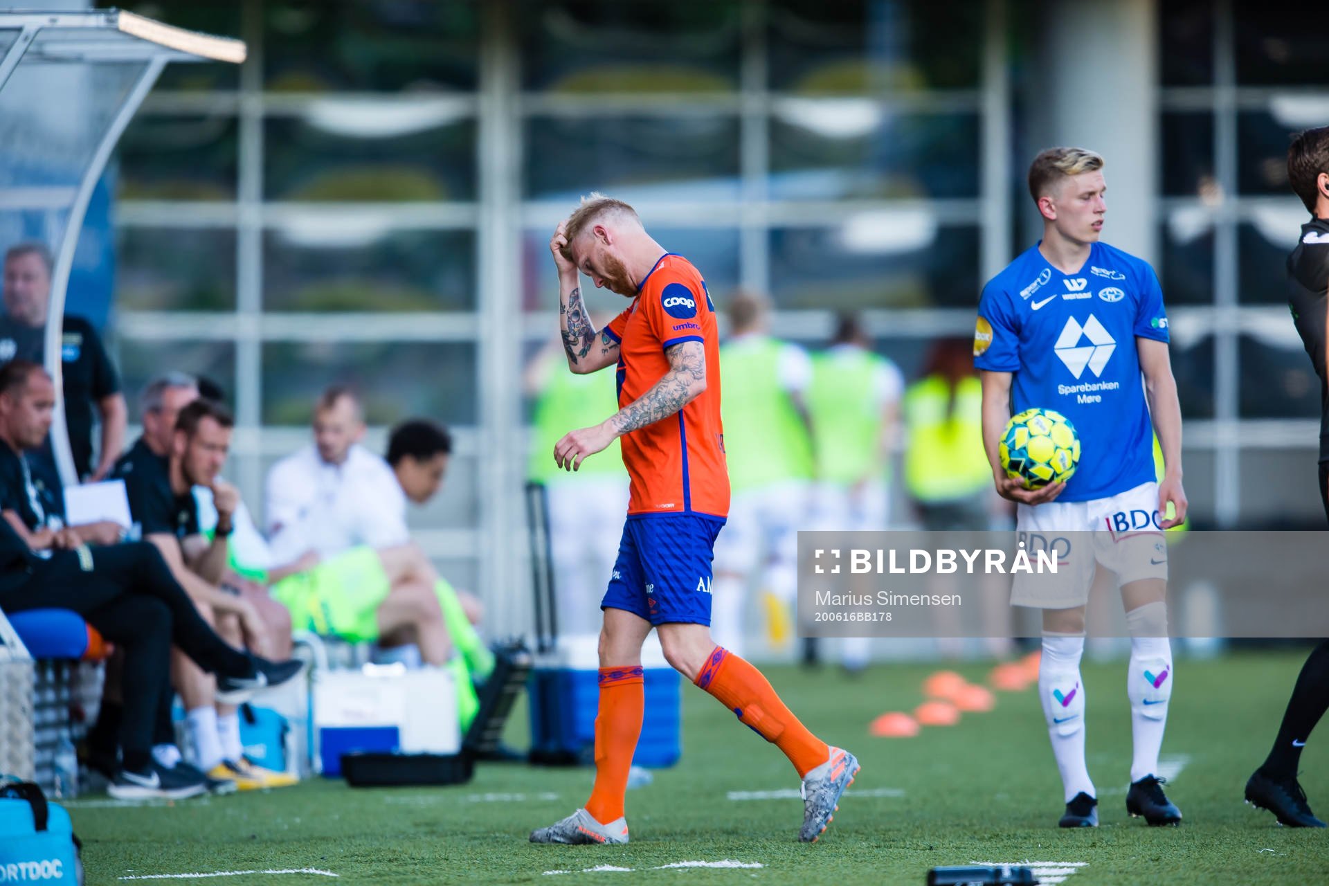 Fredrik Kjernmoen Carlsen of Aalesund leaves the pitch with