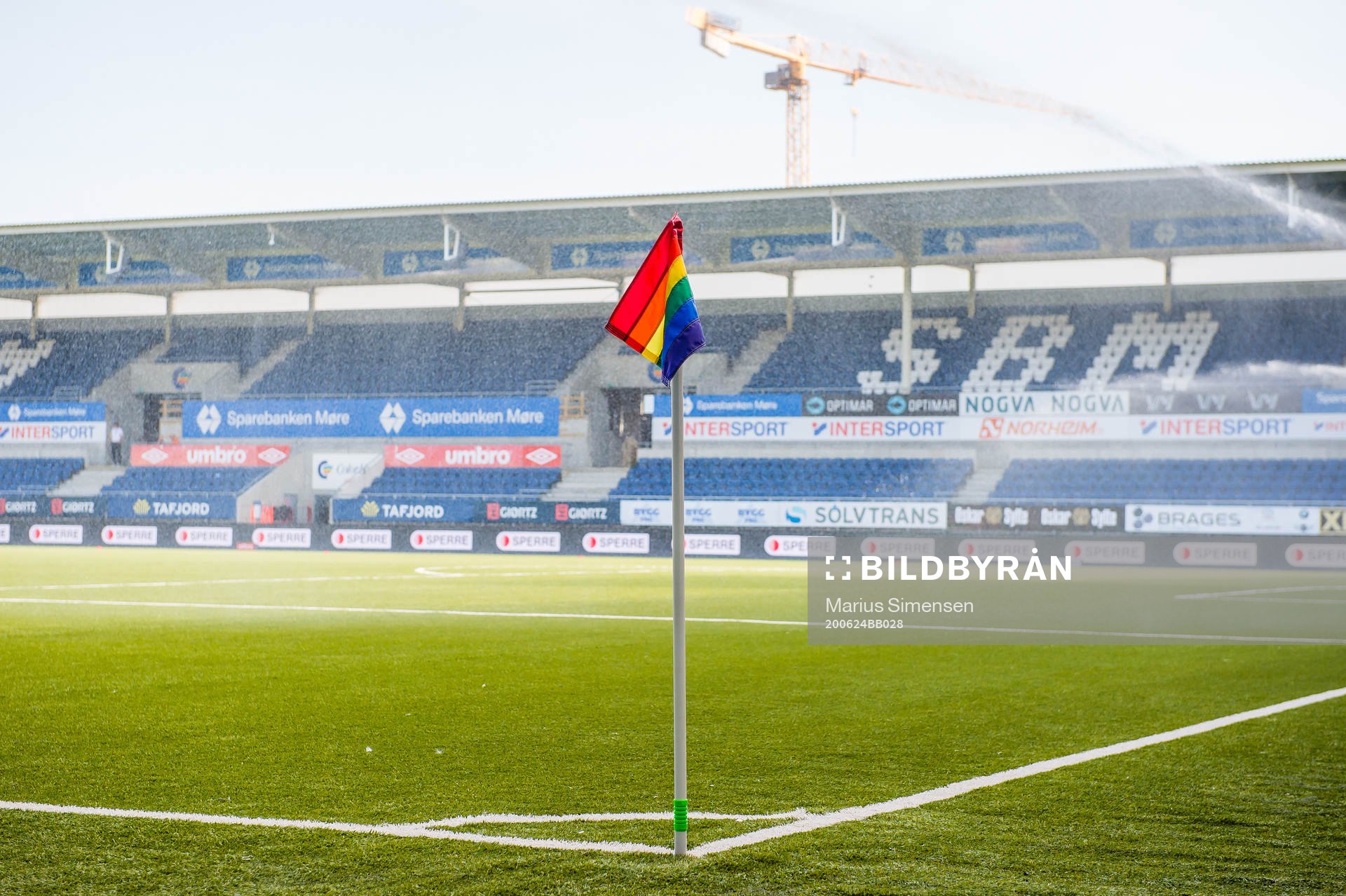 A rainbow-colored corner flag at Color Line Stadion