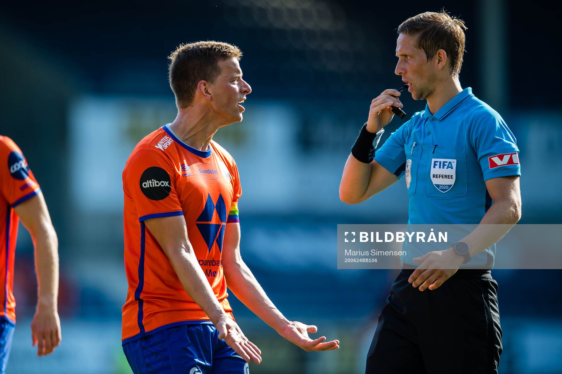 Jonas Grønner of Aalesund and Espen Andreas Eskås, referee, during the Eliteserien match between Aalesund and Brann on June 24, 2020 in Ålesund.