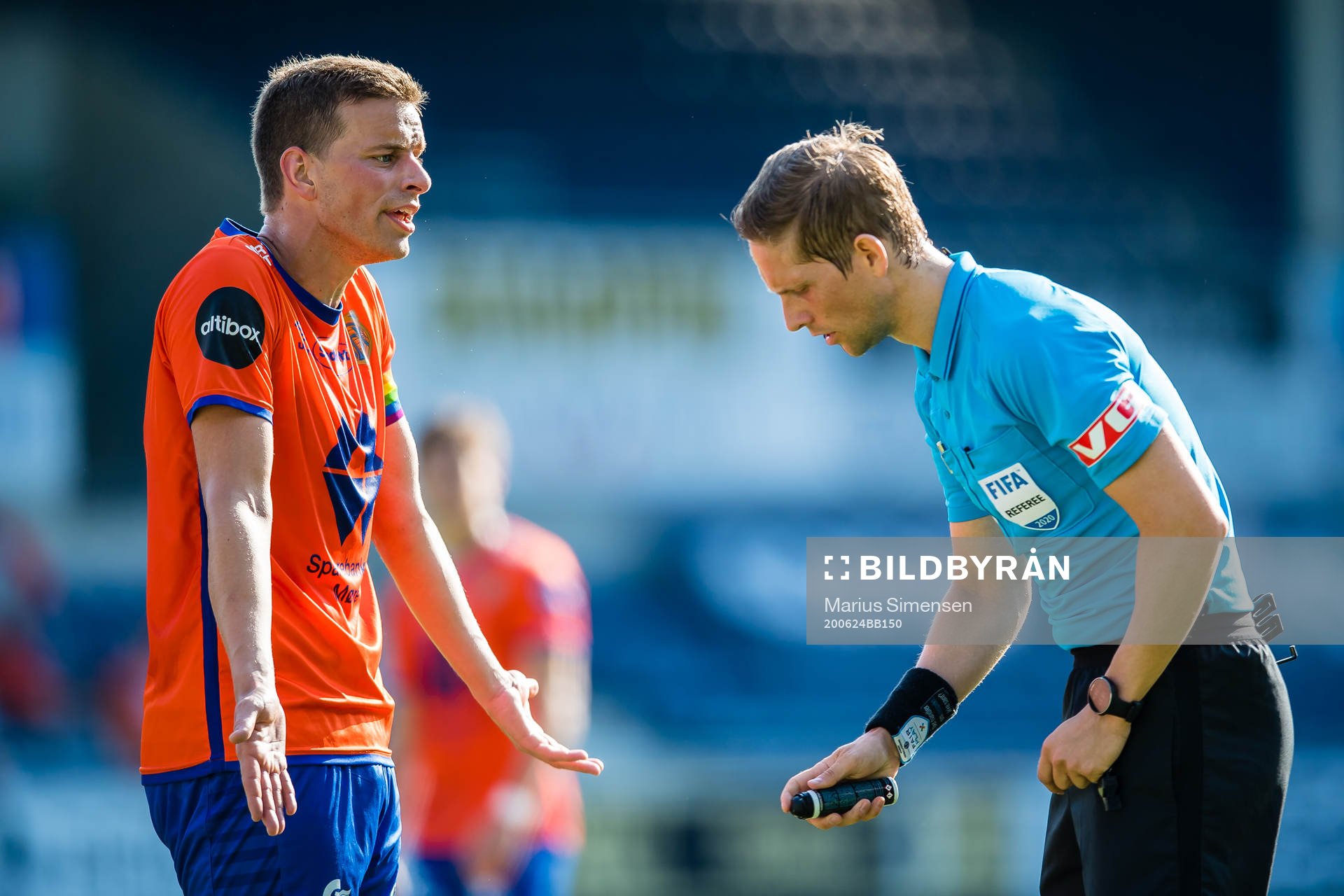 Jonas Grønner of Aalesund and Espen Andreas Eskås, referee, during the Eliteserien match between Aalesund and Brann on June 24, 2020 in Ålesund.