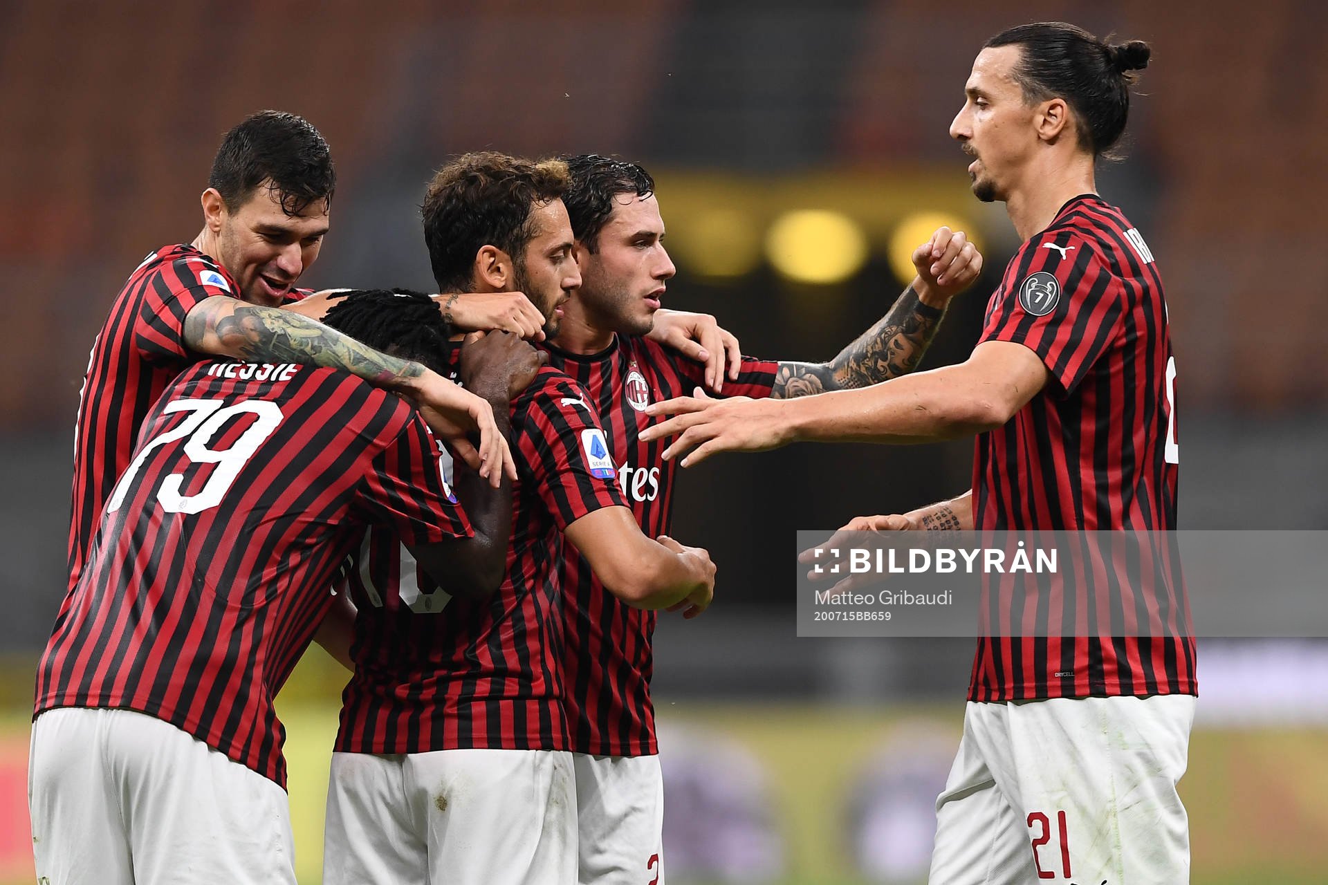Zlatan Ibrahimovic of AC Milan celebrates with teammates