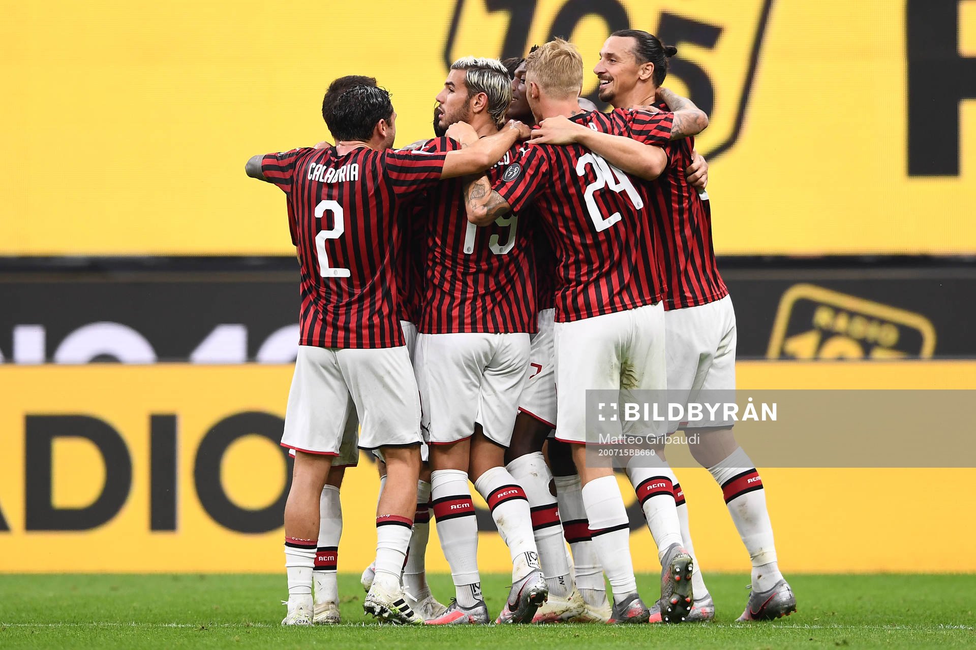 Zlatan Ibrahimovic of AC Milan celebrates with teammates