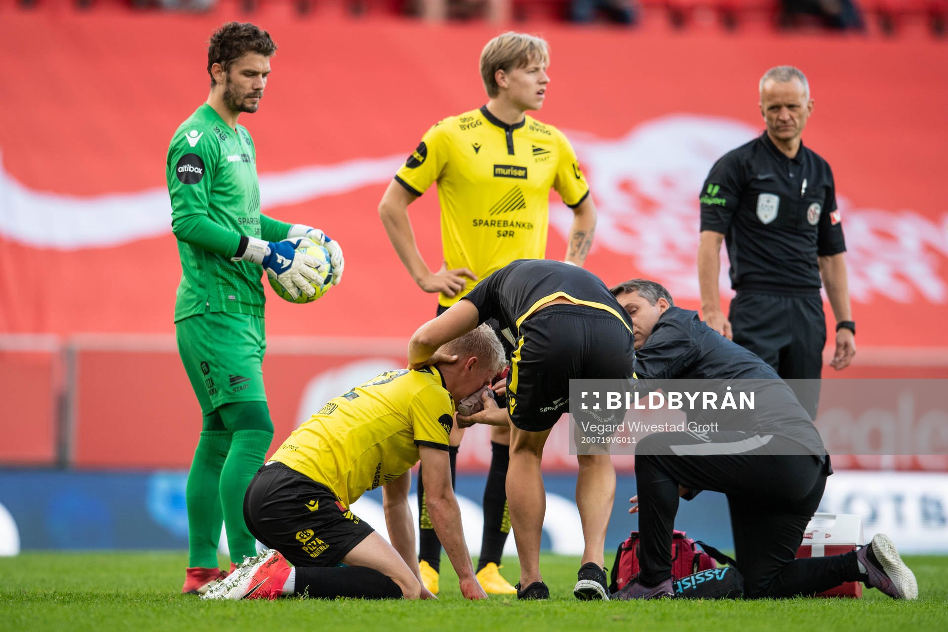 Kristoffer Tønnesen of Start receives medical attention