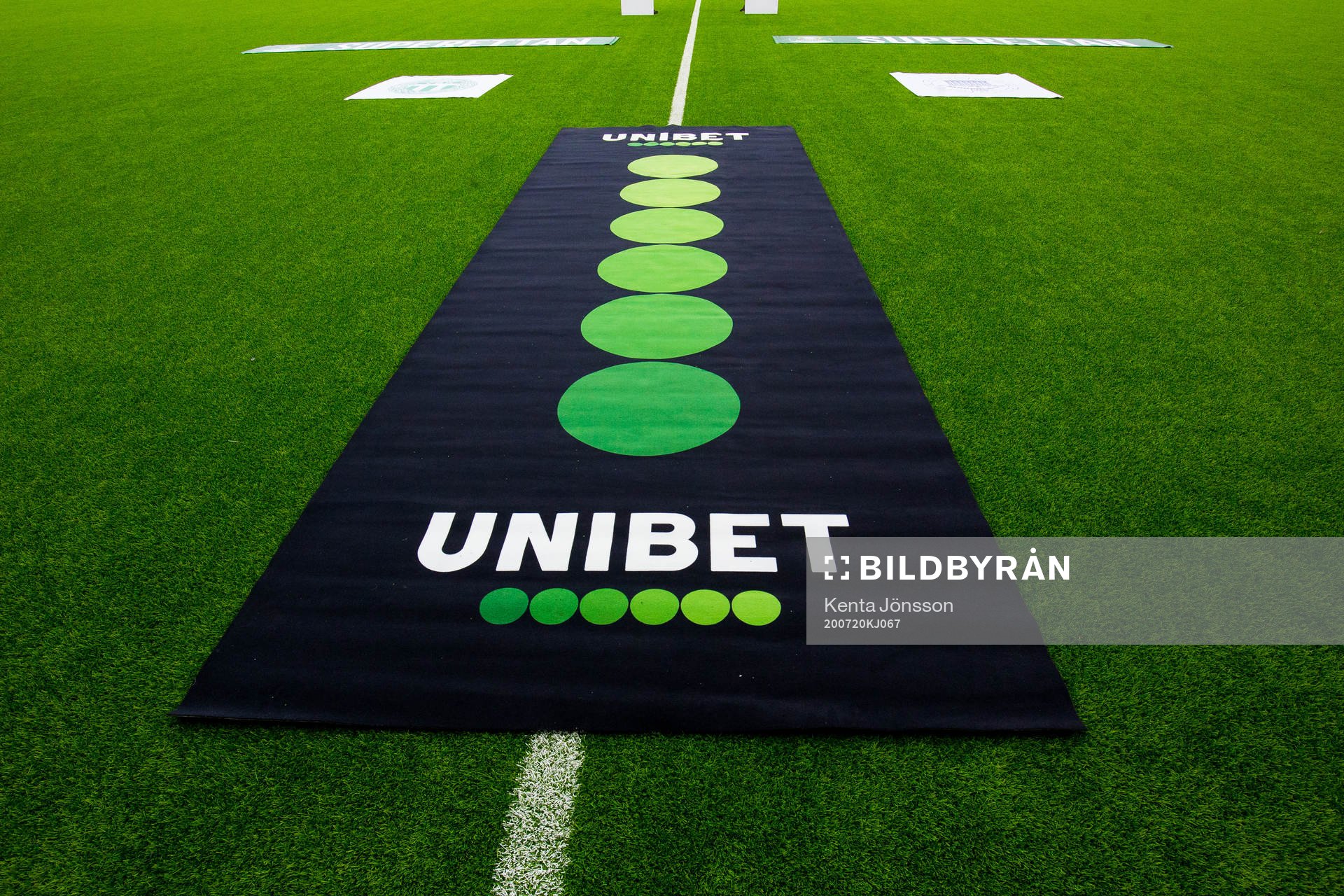 en matta med reklam för Unibet