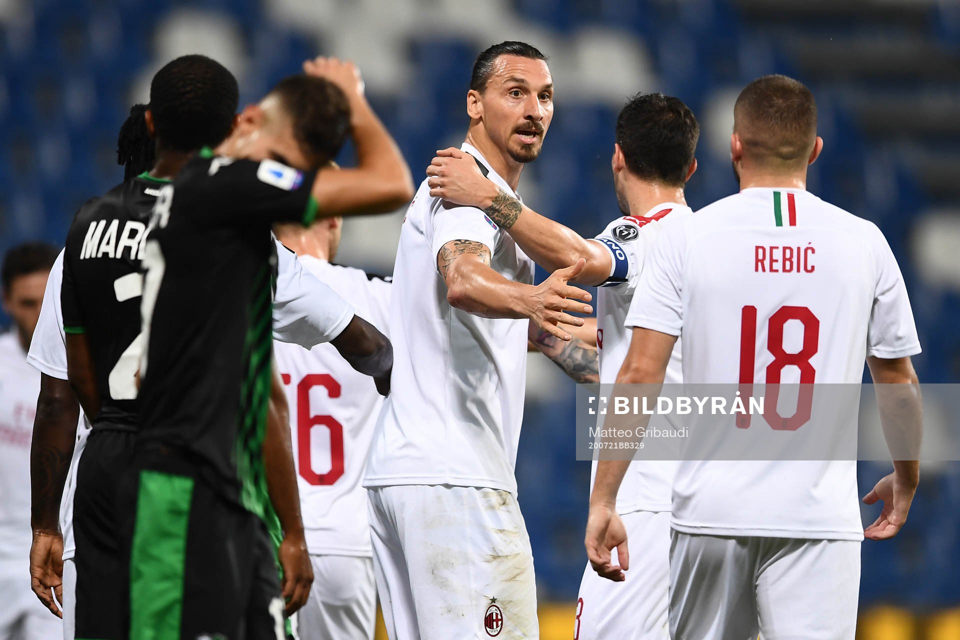 Zlatan Ibrahimovic of AC Milan celebrates with team mates