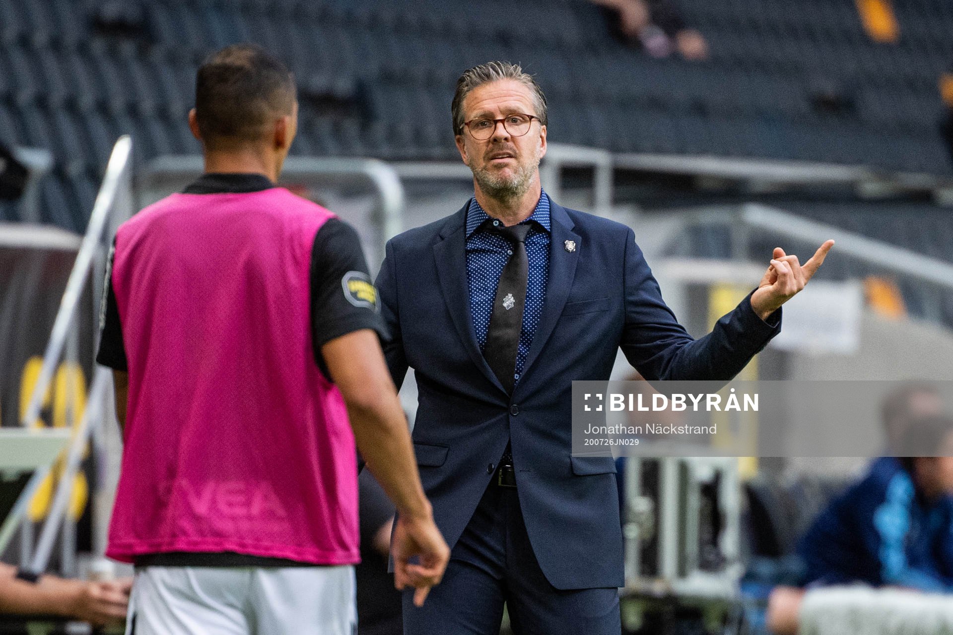 s tränare Rikard Norling och AIK:s Nabil Bahoui