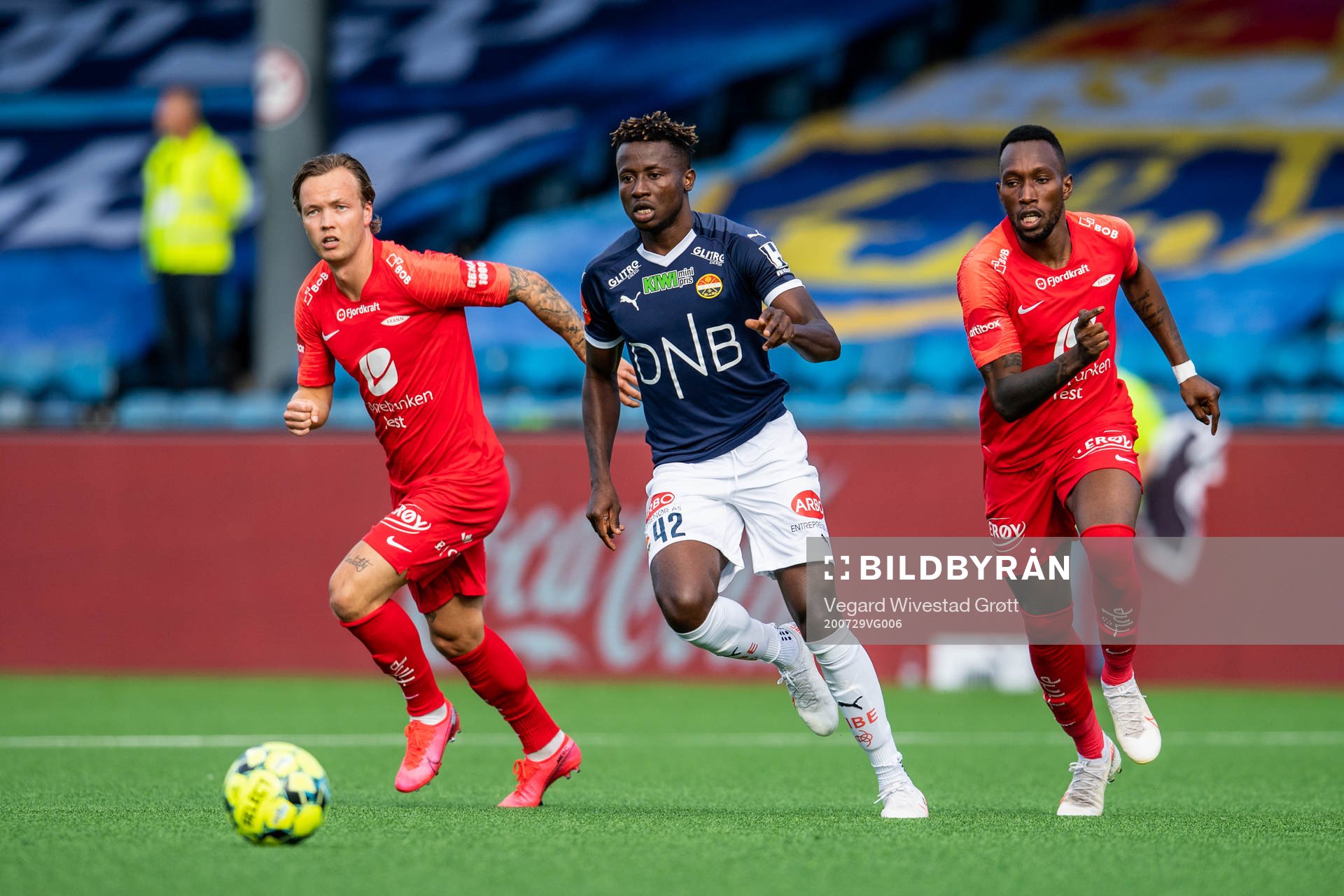 Fredrik Haugen and Daouda Bamba of Brann against Jack Ipalibo of Strømsgodset during the Eliteserien football match between Strømsgodset and Brann on July 29, 2020 in Drammen.