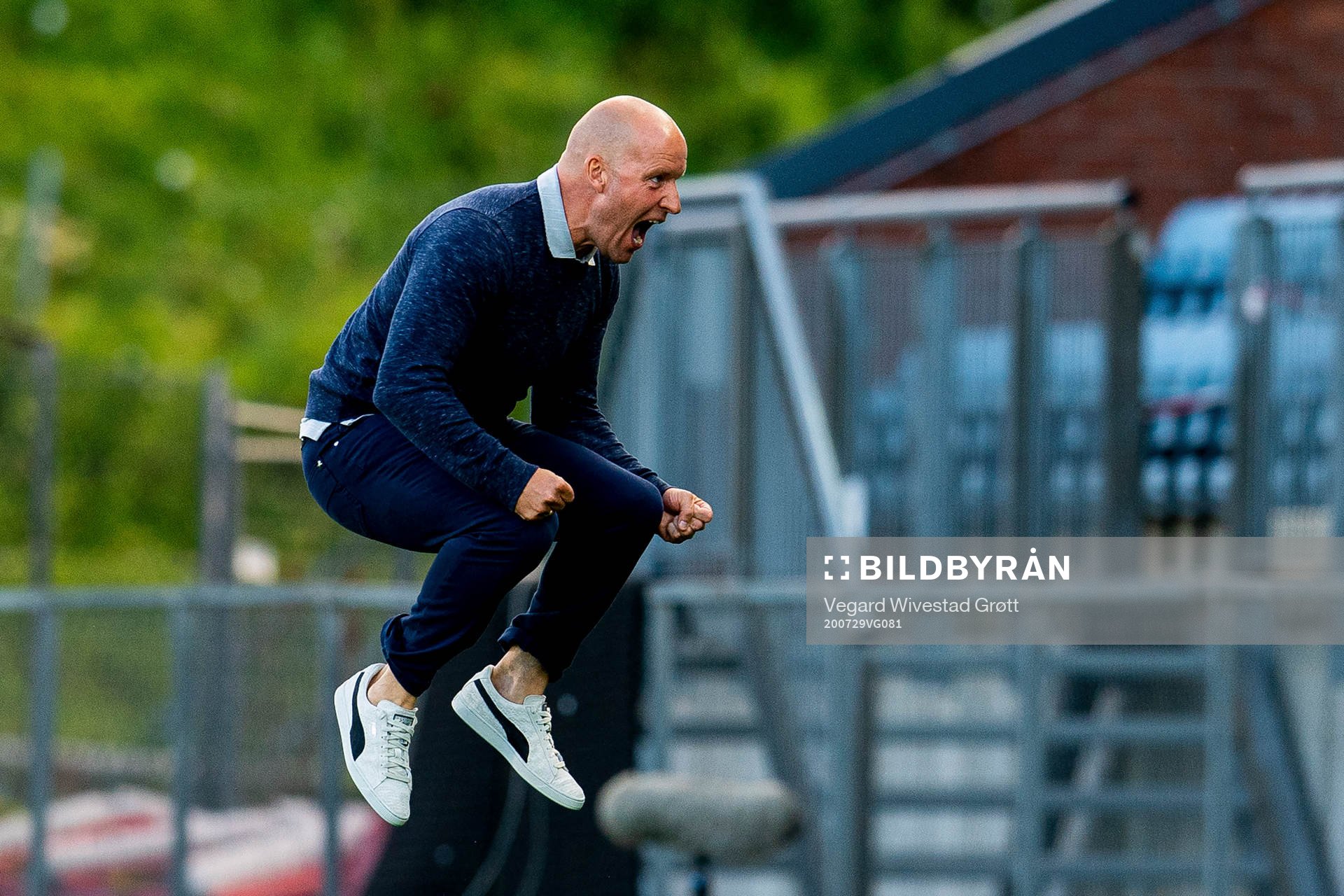 Henrik Pedersen, head coach of Strømsgodset, celebrates