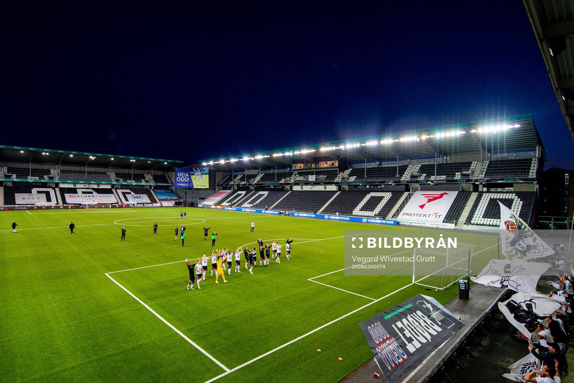 Players and staff of Odd celebrate