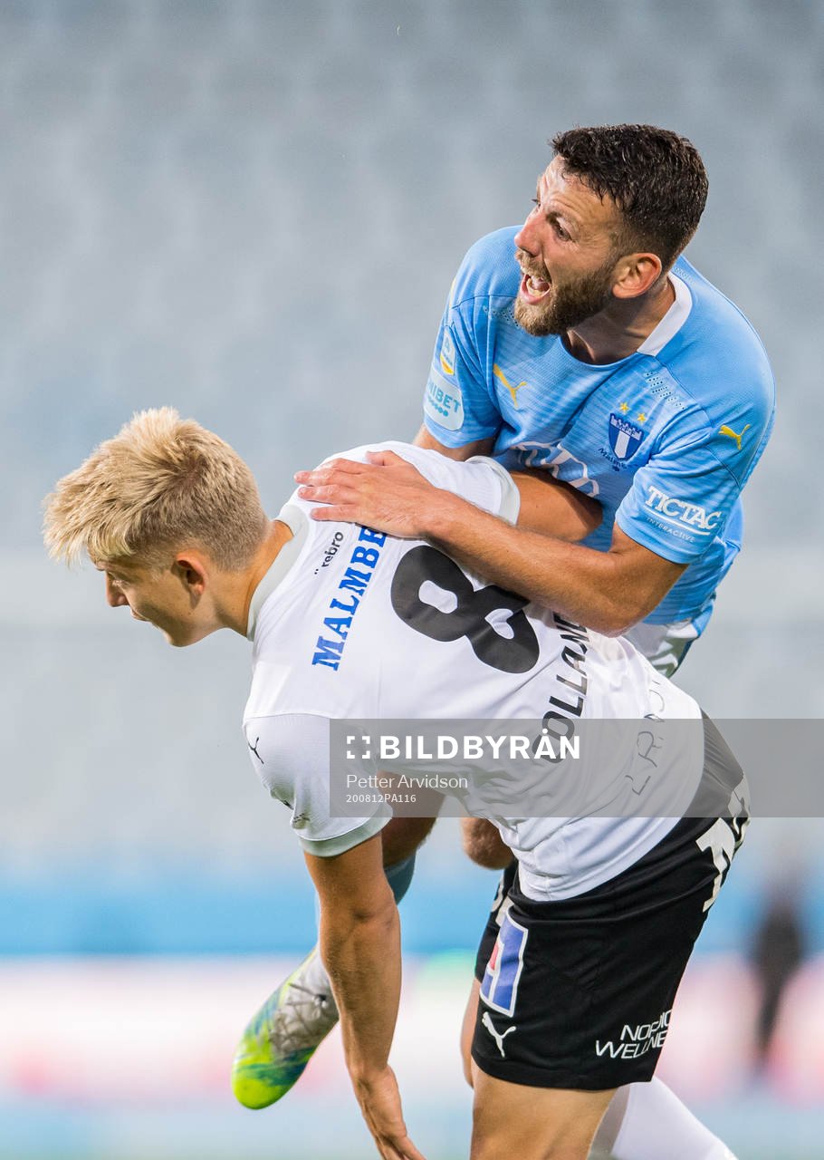 Malmö FFs Erdal Rakip och Örebros Dennis Collander i en