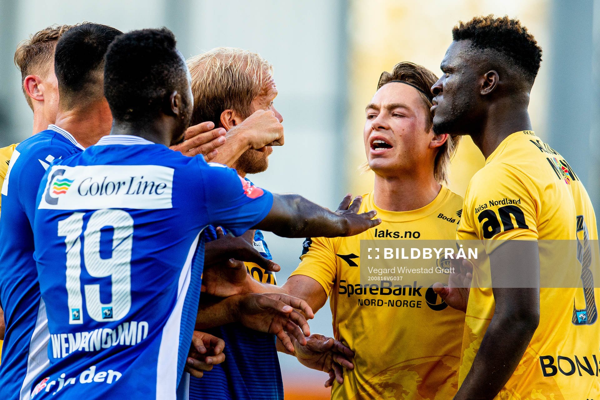 Brice Wembangomo and Lars Grorud of Sandefjord argue with Patrick Berg and Viktor Boniface of Bodø/Glimt during the Eliteserien football match between Sandefjord and Bodø/Glimt on August 16, 2020 in Sandefjord.