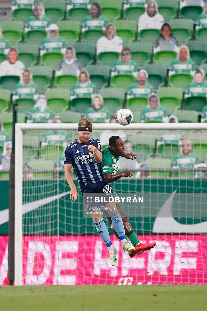 Jacob Une Larsson of Djurgården and Franck Boli of