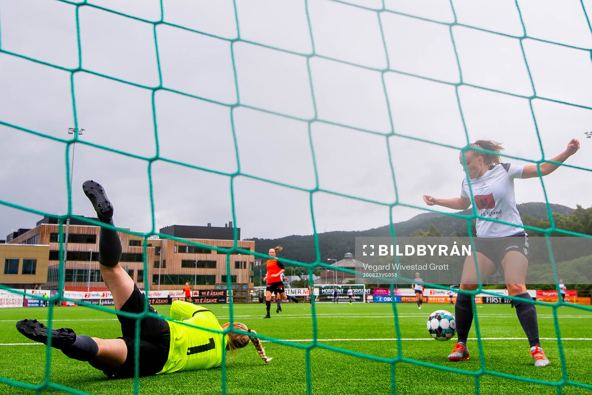 Goalkeeper Kristin Rage and Ingrid Bergland of Amazon