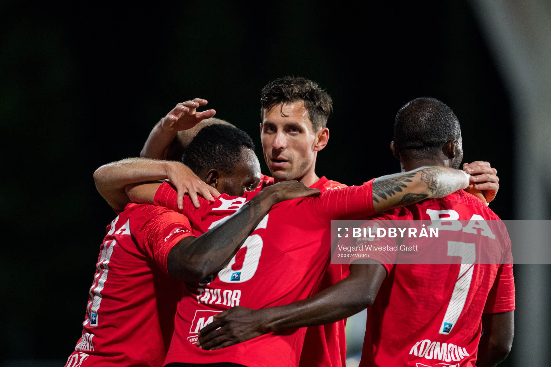 Daniel Alexander Pedersen of Brann celebrates with teammates after the 0-1 goal during the Eliteserien football match between Stabæk and Brann on August 24, 2020 in Bekkestua.