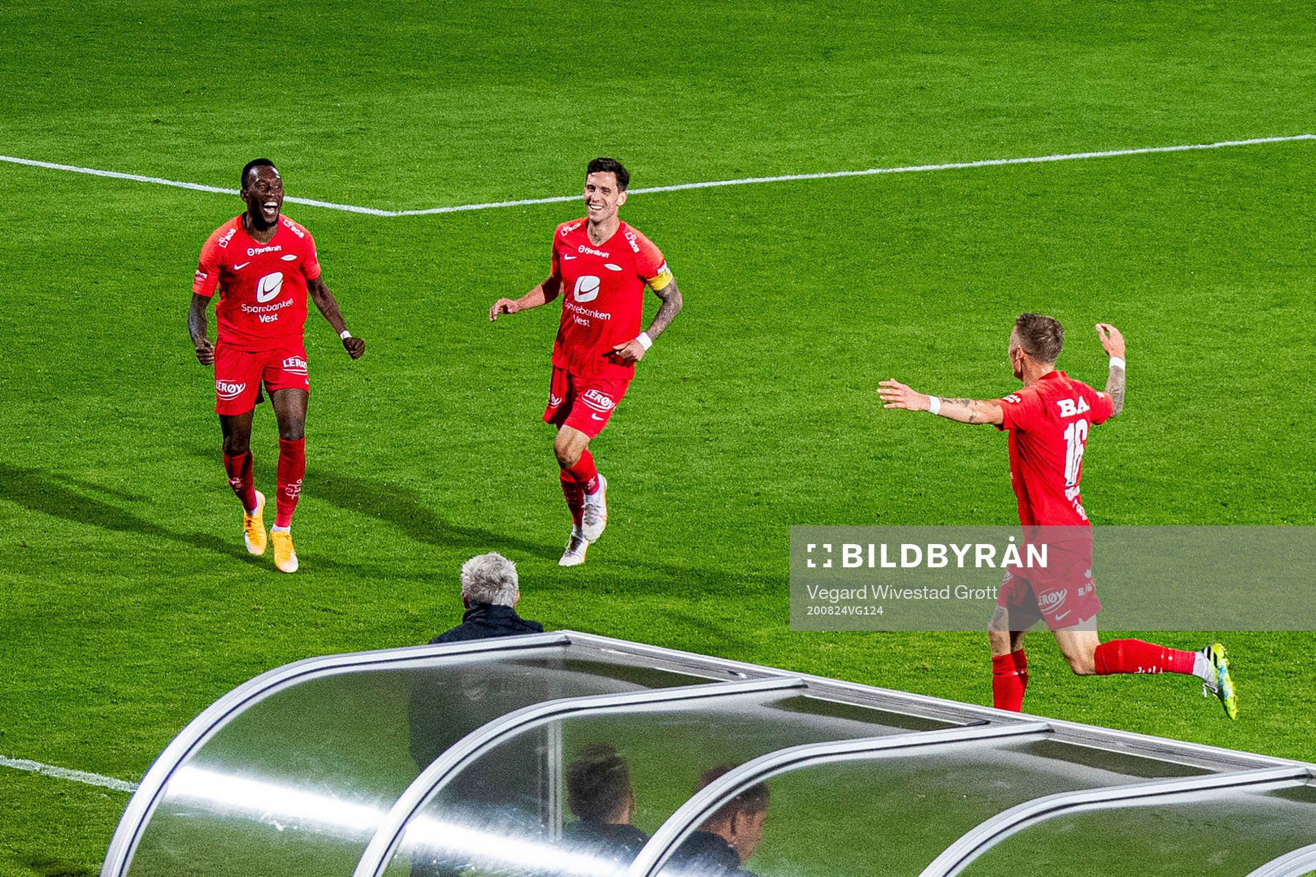 Daouda Bamba of Brann celebrates with teammates Daniel