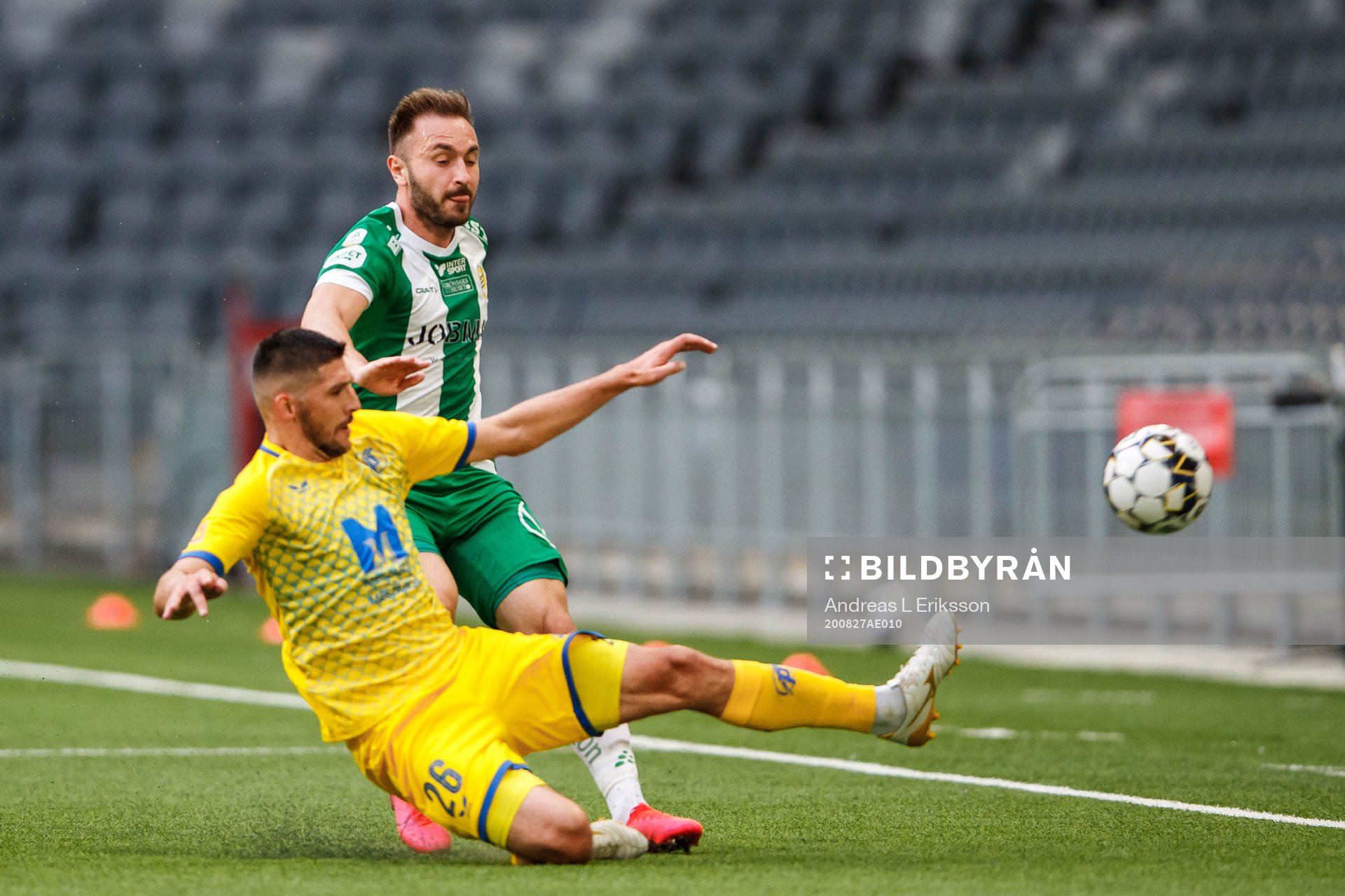 Marton Radics of Puskas and Muamer Tankovic of Hammarby
