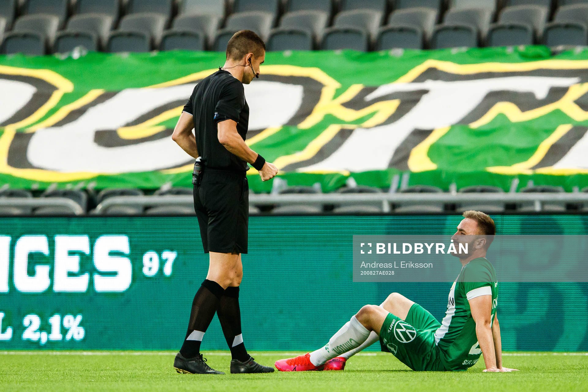 Referee Mario Zebec and Muamer Tankovic of Hammarby