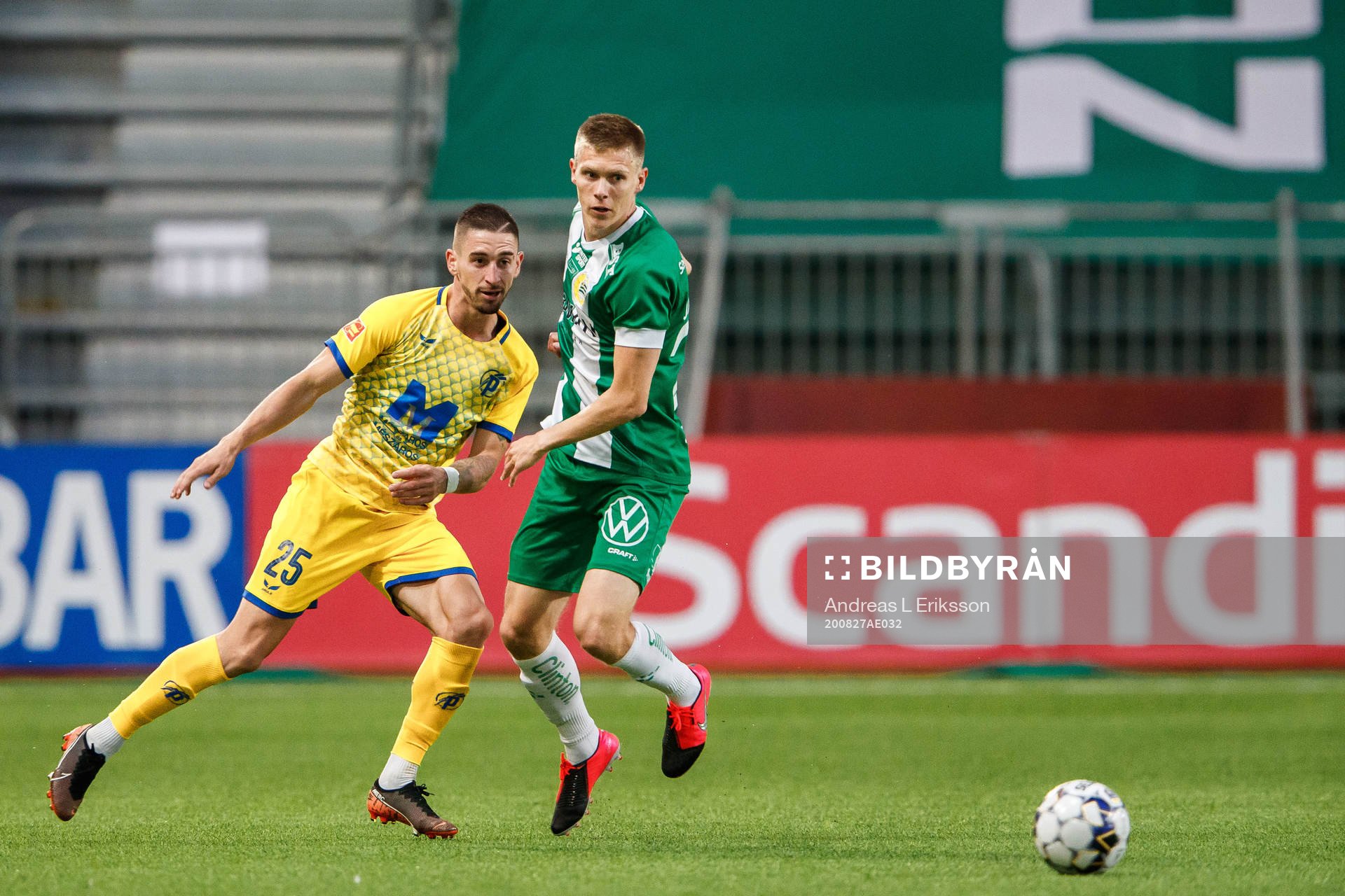 Zsolt Nagy of Puskas and Aron Johansson of Hammarby