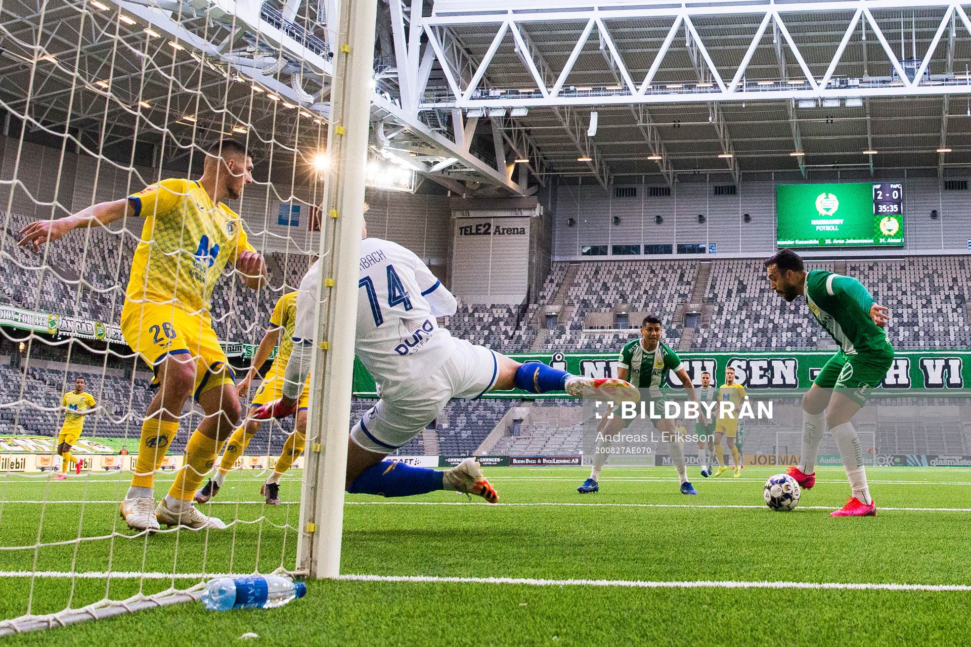 Abdul Khalili of Hammarby challenges goalkeeper Martin