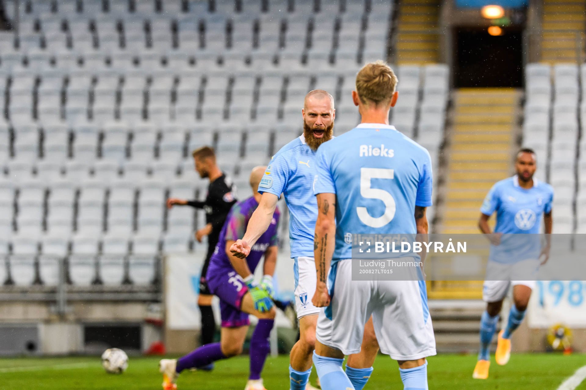 Jo Inge Berget celebrates with Sören Rieks of Malmö FF