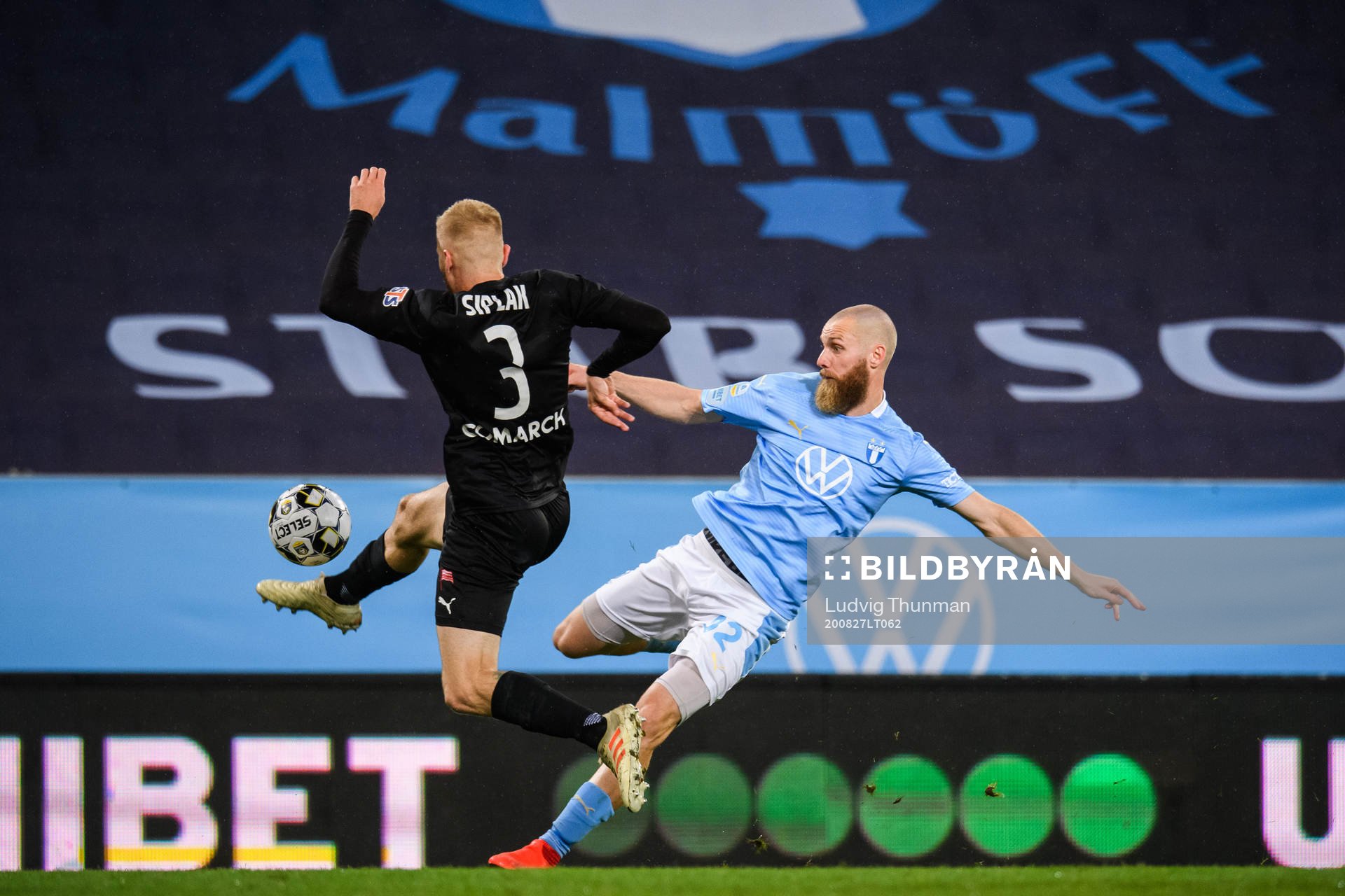 Jo Inge Berget of Malmö FF and Michal Siplak of Cracovia