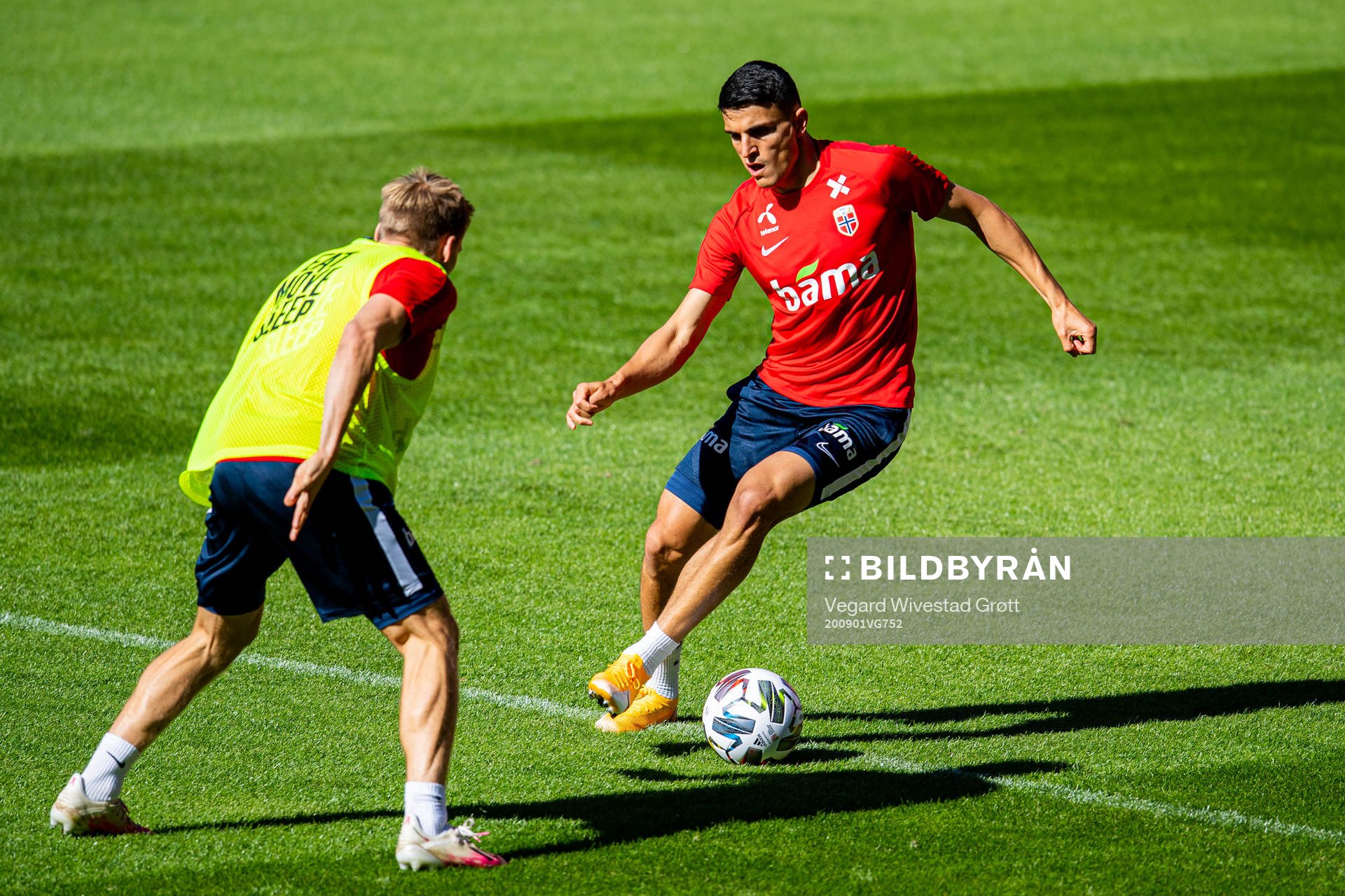 Jonas Svensson and Mohamed Elyounoussi of the Norwegian
