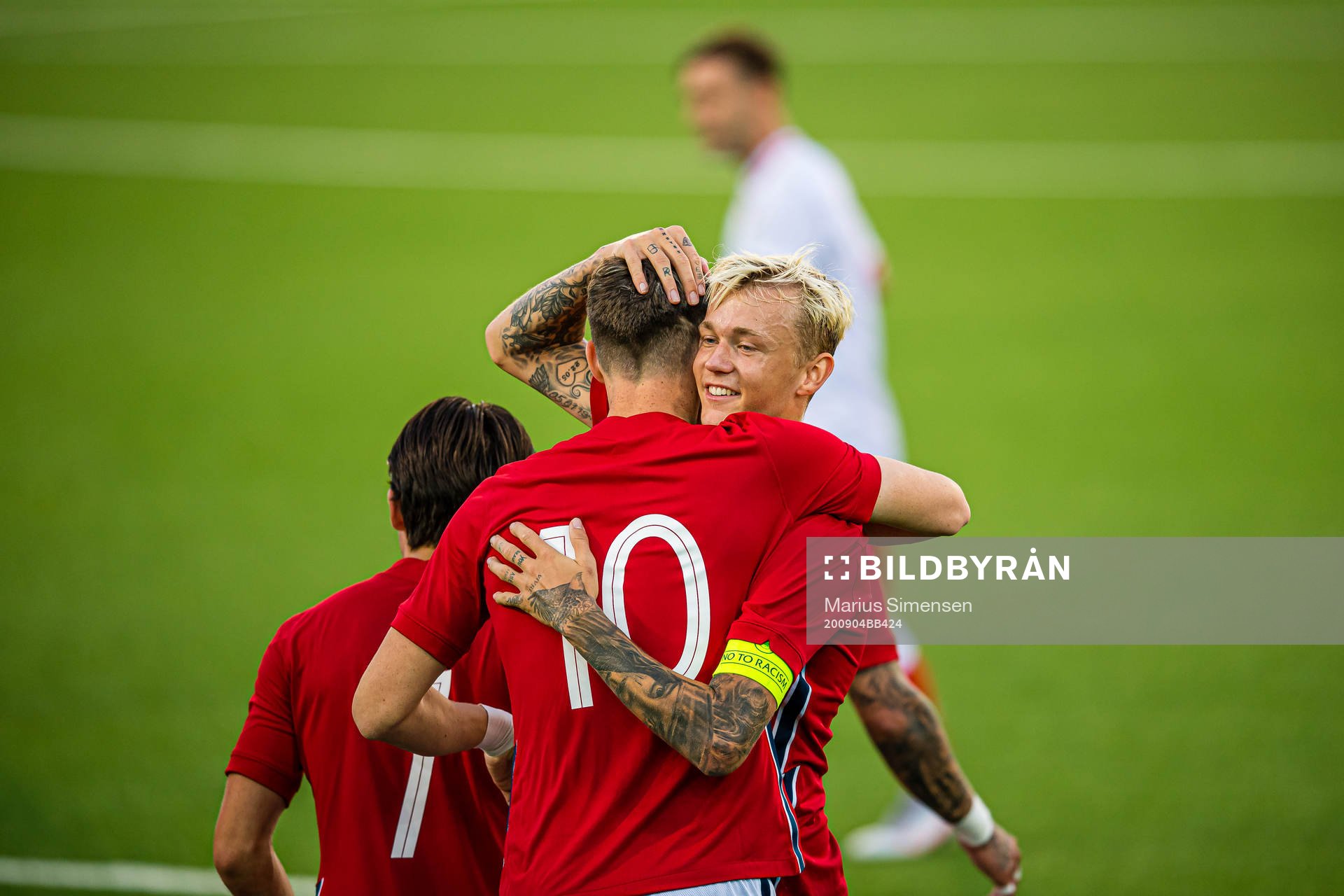Jørgen Strand Larsen of Norway celebrates with Birk Risa