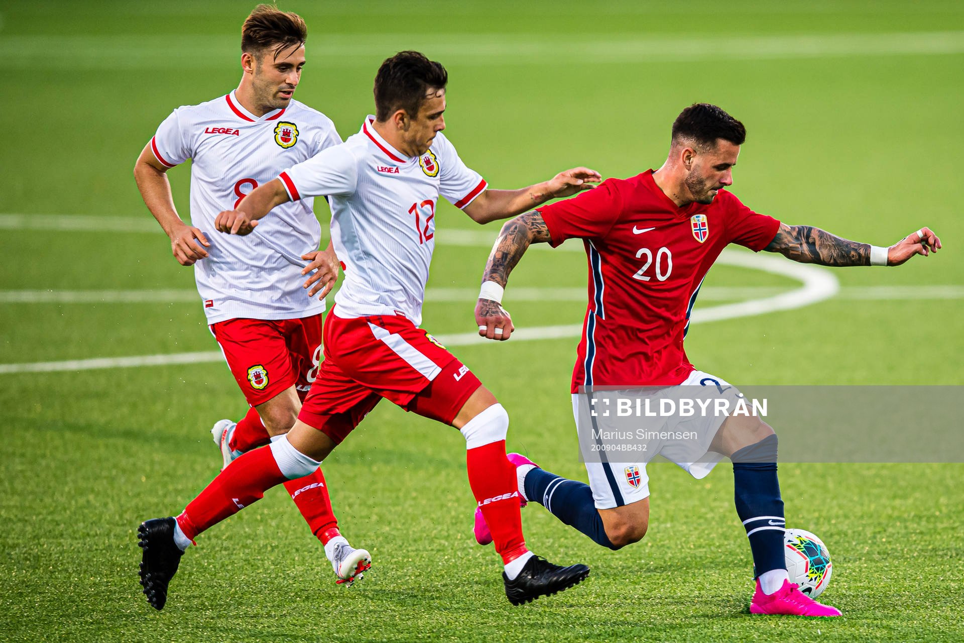 Kieron Garcia of Gibraltar and Aron Dønnum of Norway