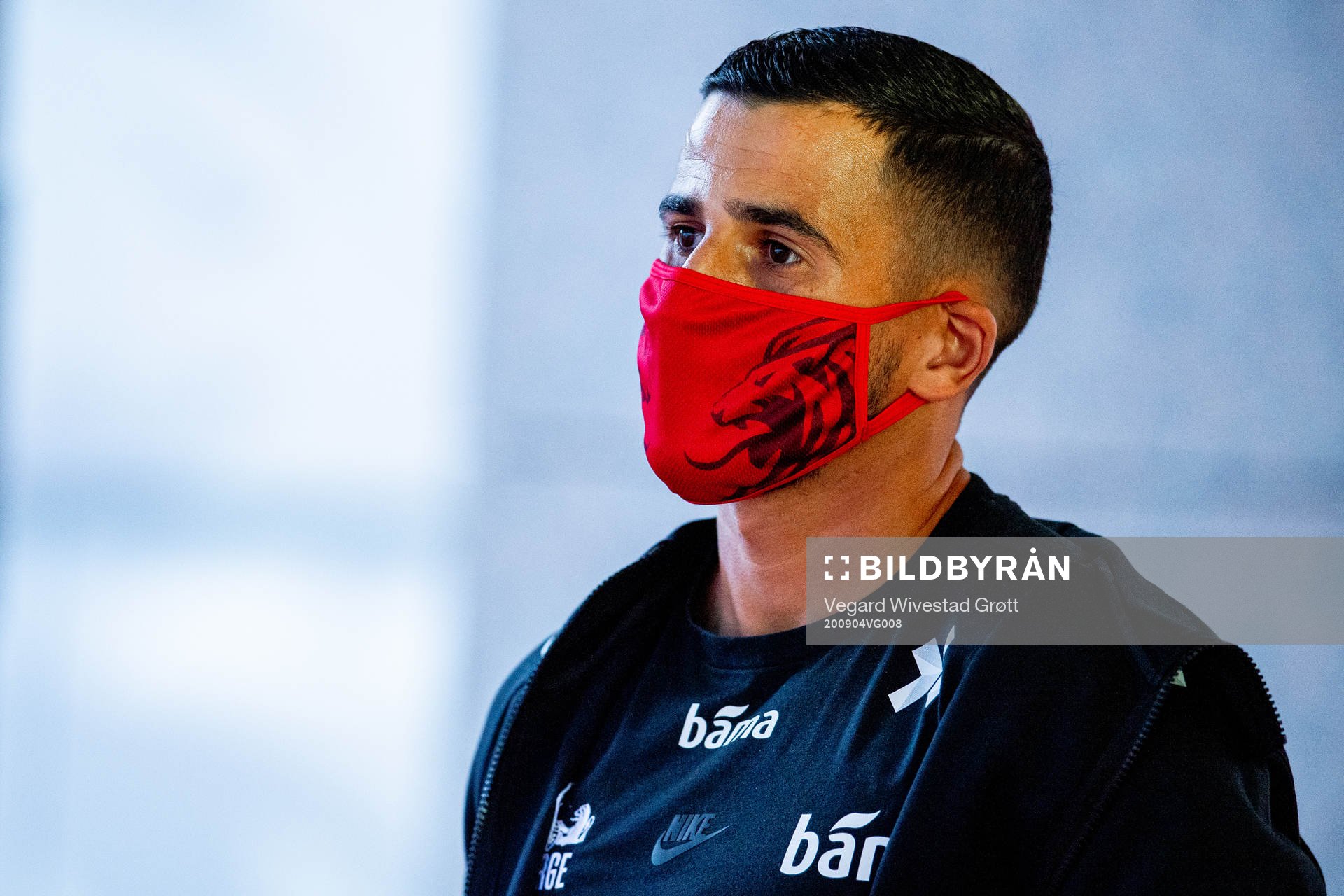 Omar Elabdellaoui of Norway arrives wearing a face mask