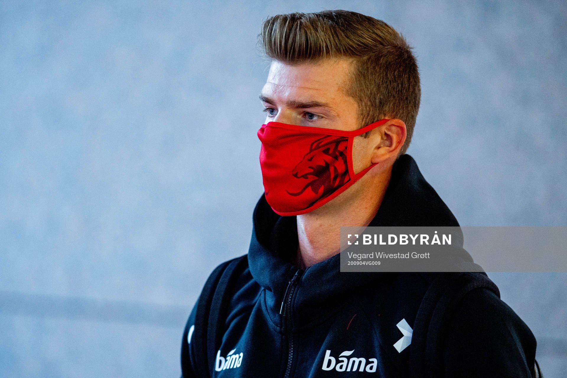 Alexander Sørloth of Norway arrives wearing a face mask