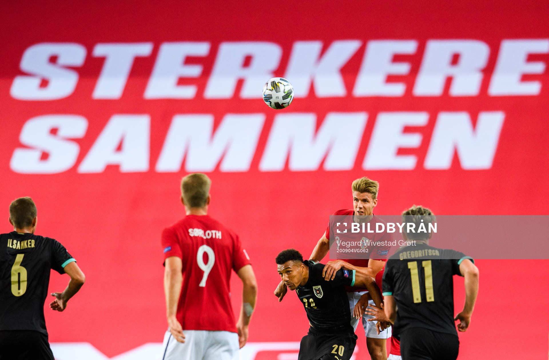 Karim Onisiwo of Austria against Kristoffer Ajer of Norway