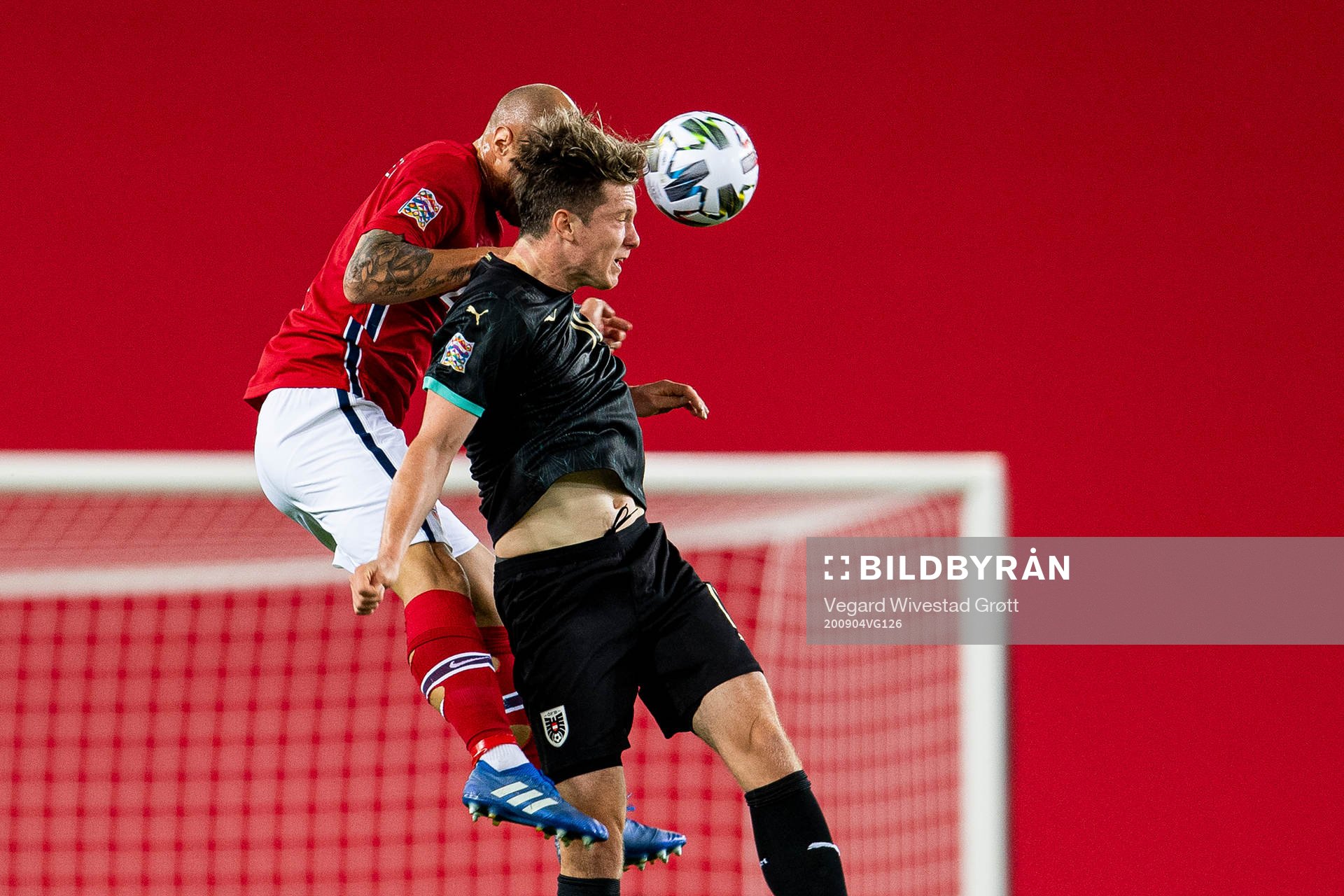 Tore Reginiussen of Norway and Michael Gregoritsch of