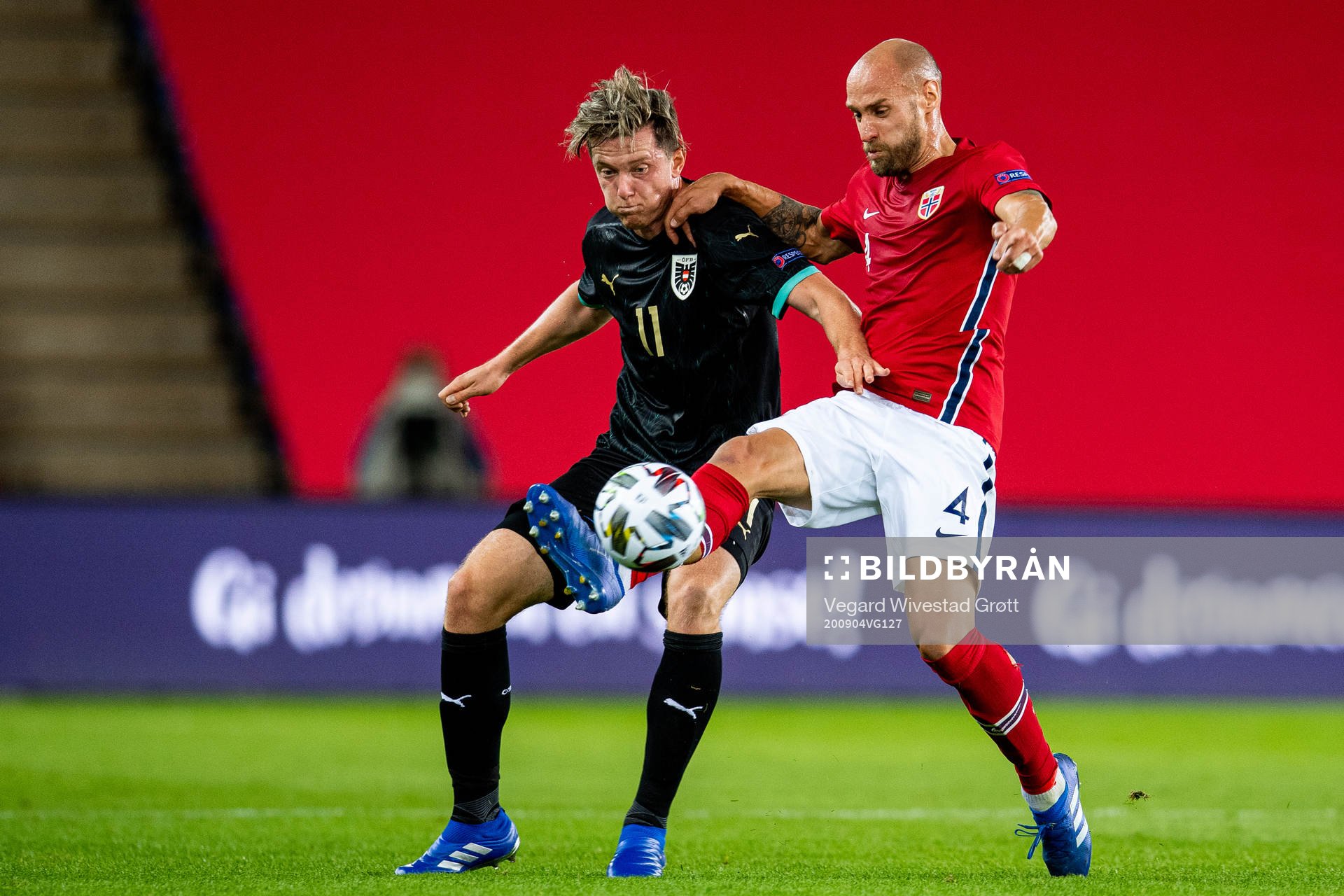 Michael Gregoritsch of Austria and Tore Reginiussen of